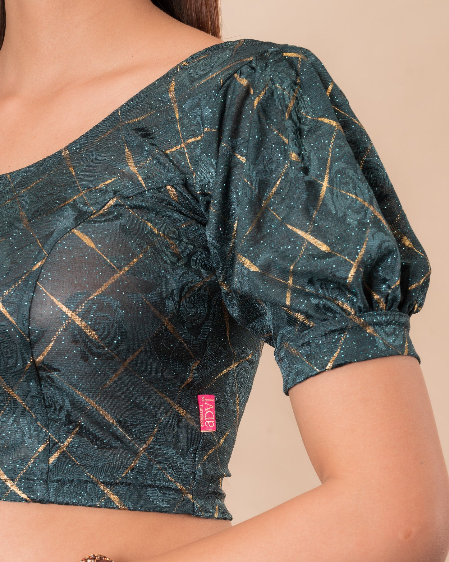 Close-up of the melange jacquard fabric detailing the texture and subtle gold glitter of the readymade blouse