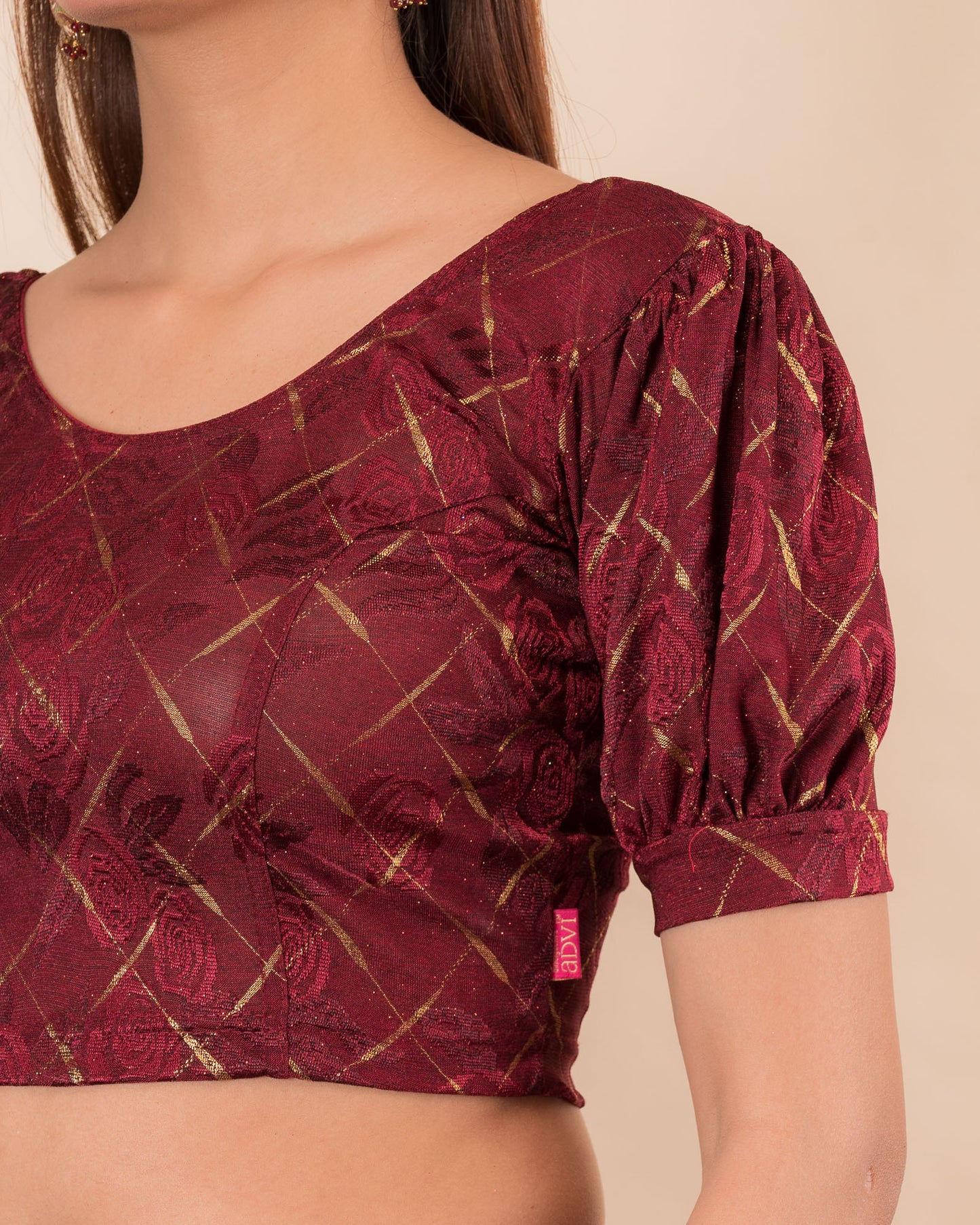 Close-up of the melange jacquard fabric detailing the texture and subtle gold glitter of the readymade blouse