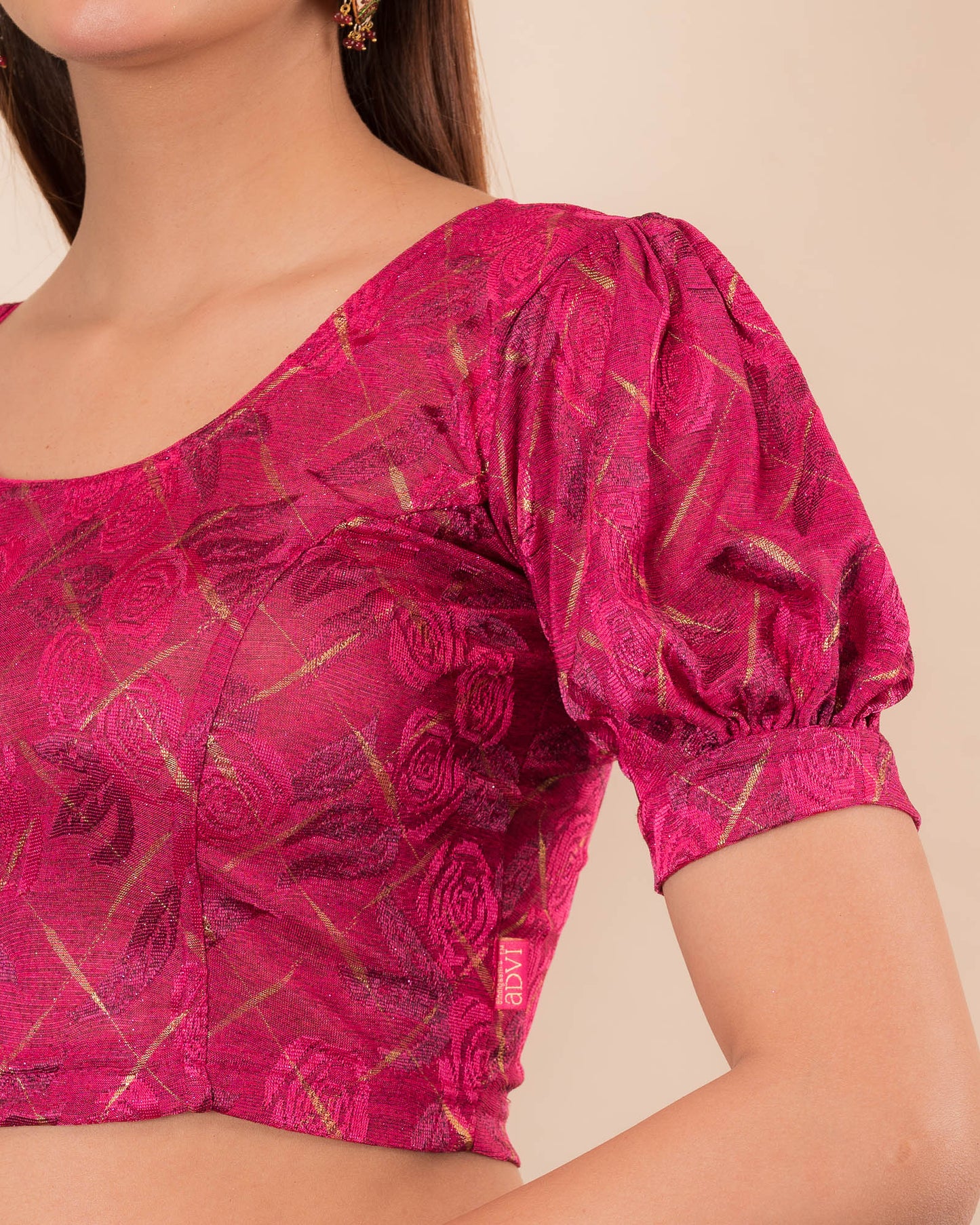 Close-up of the melange jacquard fabric detailing the texture and subtle gold glitter of the readymade blouse
