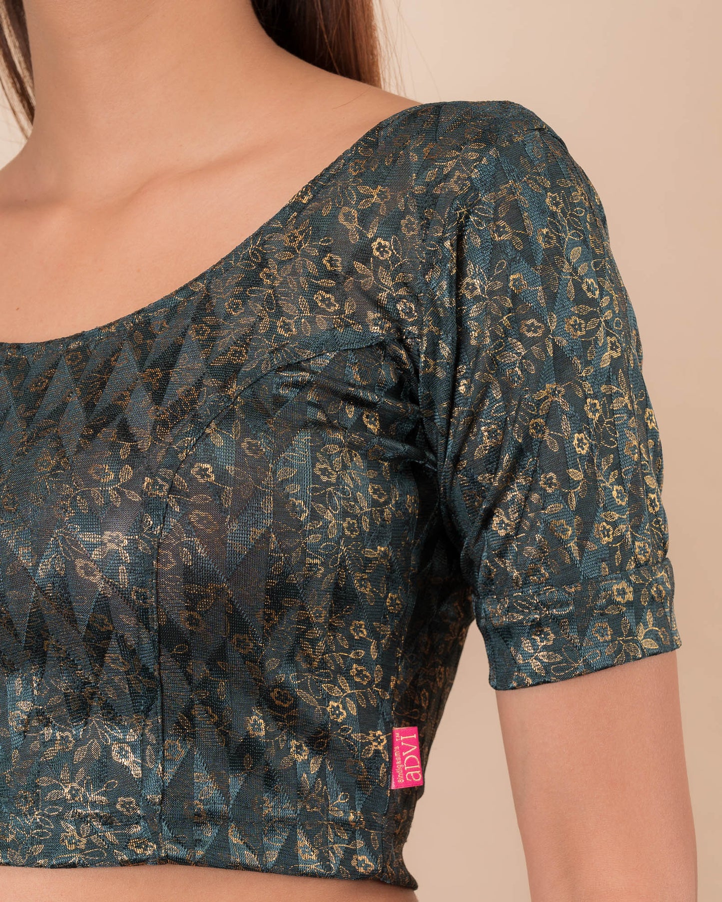 Close-up of the melange jacquard fabric with metallic foil and texture