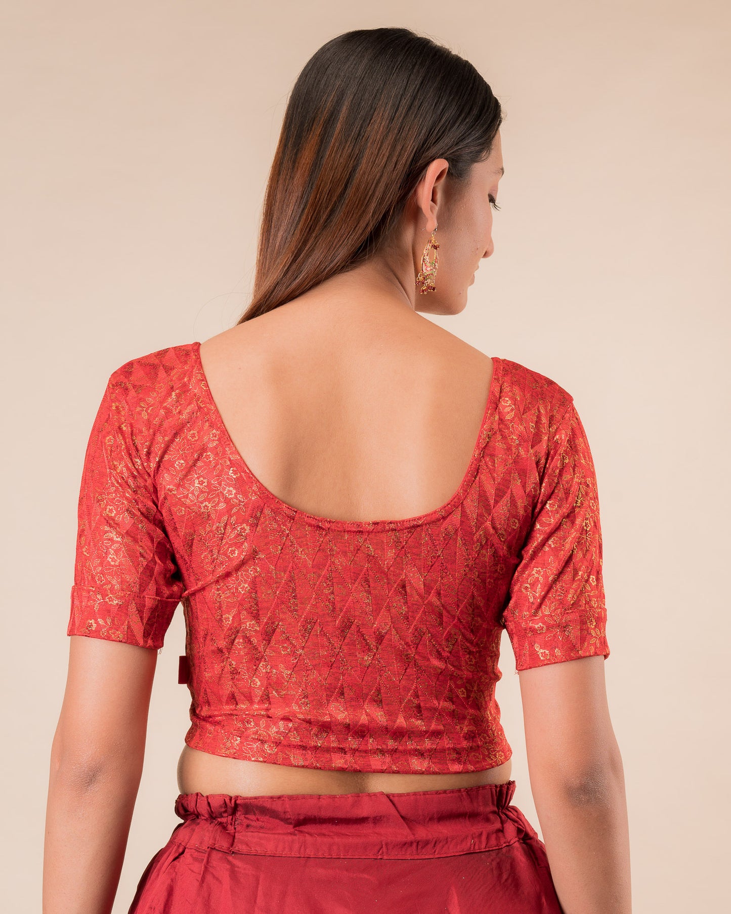 Rear view showcasing the back design of the slip-on blouse