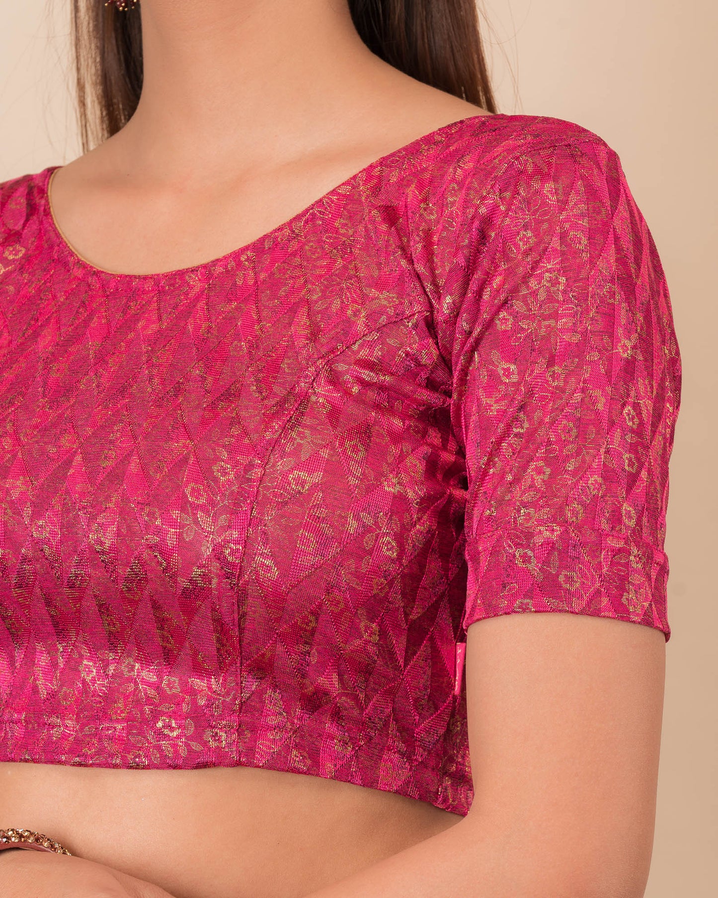 Close-up of the melange jacquard fabric with metallic foil and texture