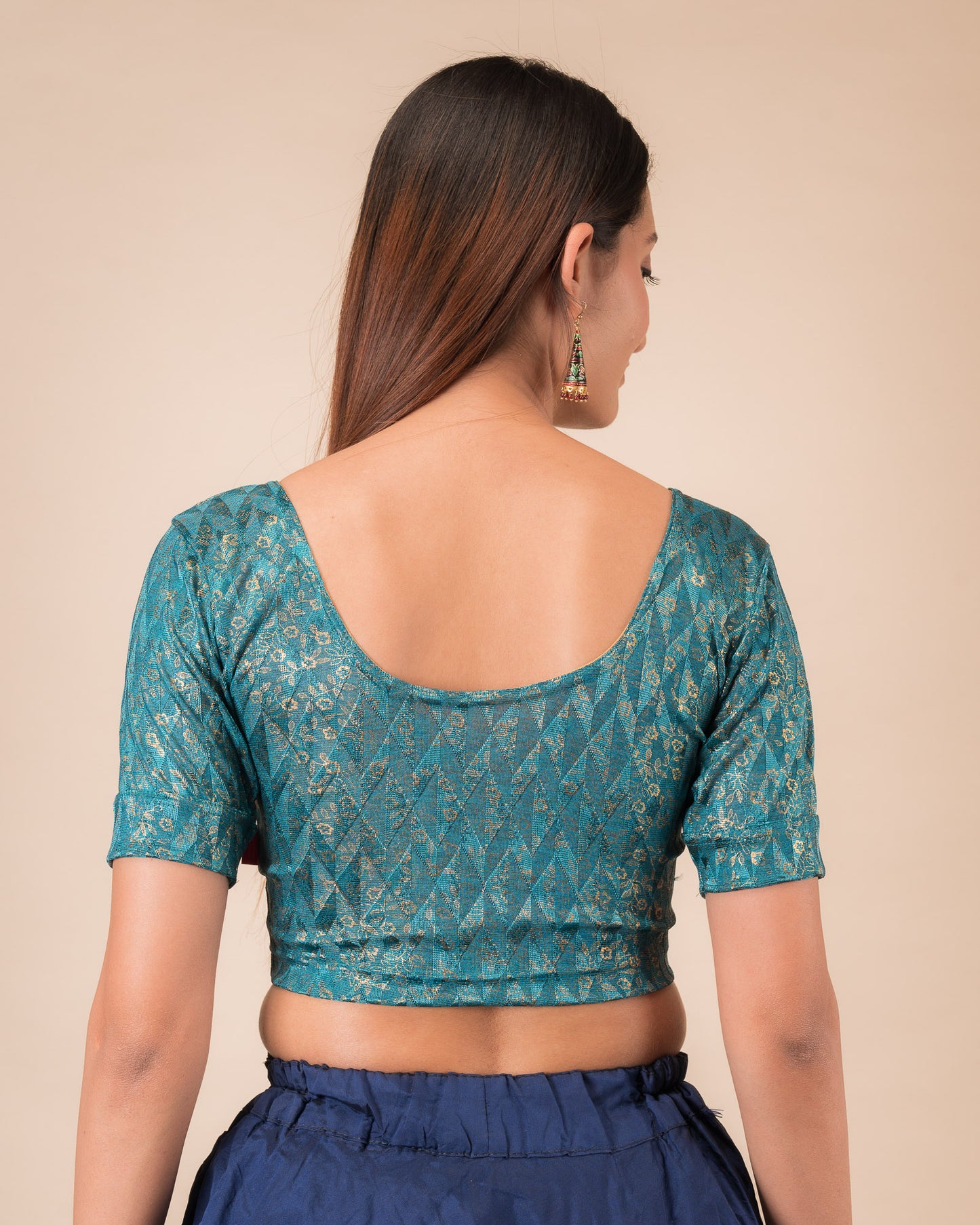 Rear view showcasing the back design of the slip-on blouse