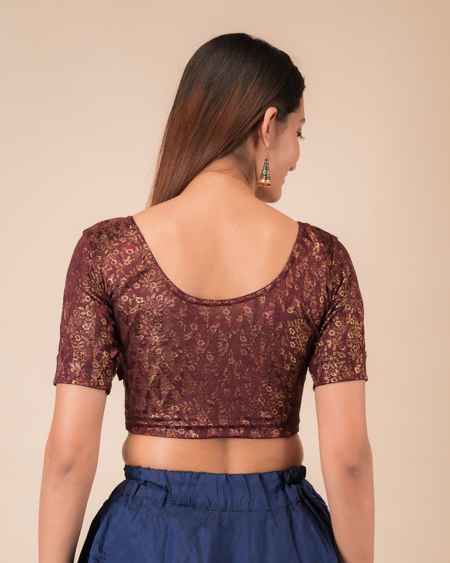 Rear view showcasing the back design of the slip-on blouse