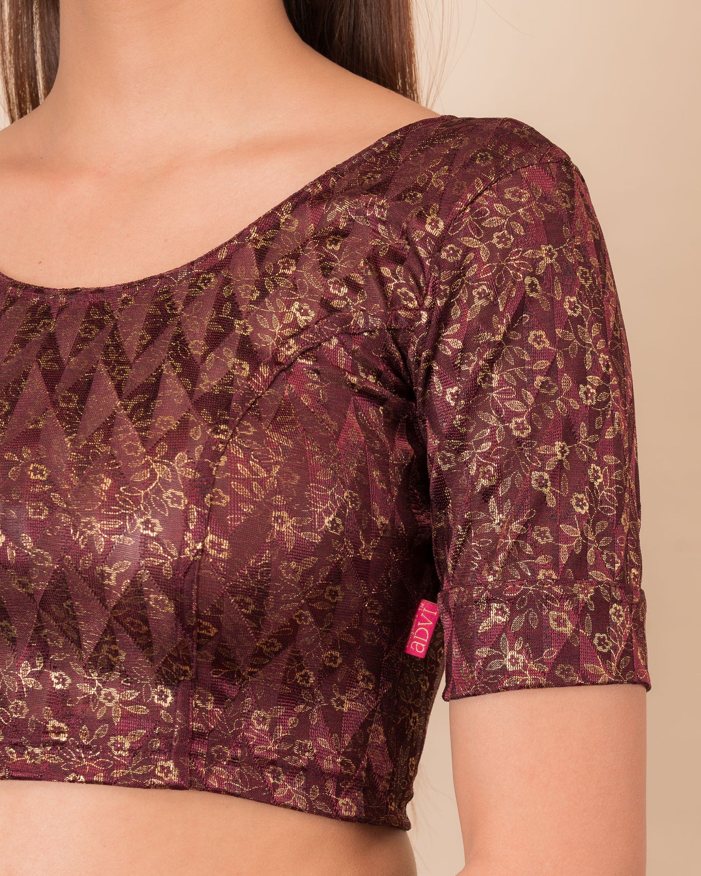 Close-up of the melange jacquard fabric with metallic foil and texture