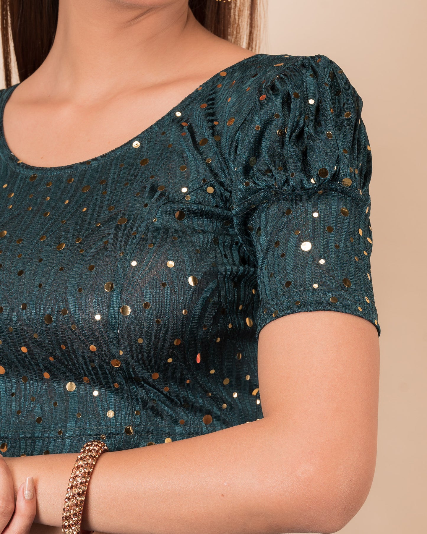 Close-up showing mirror embellishments on the jacquard stretchable fabric