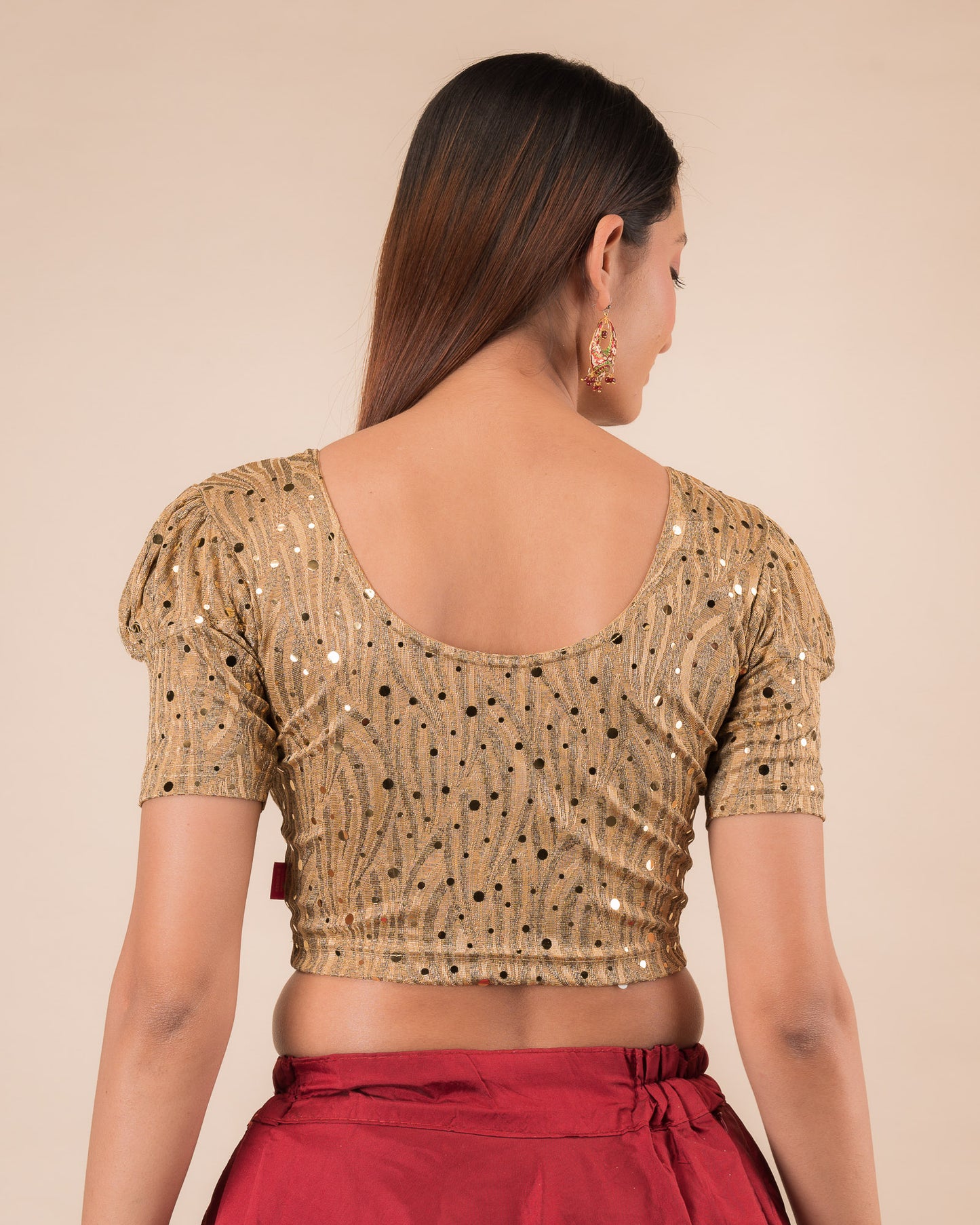 Rear view showing the round back design and mirror work