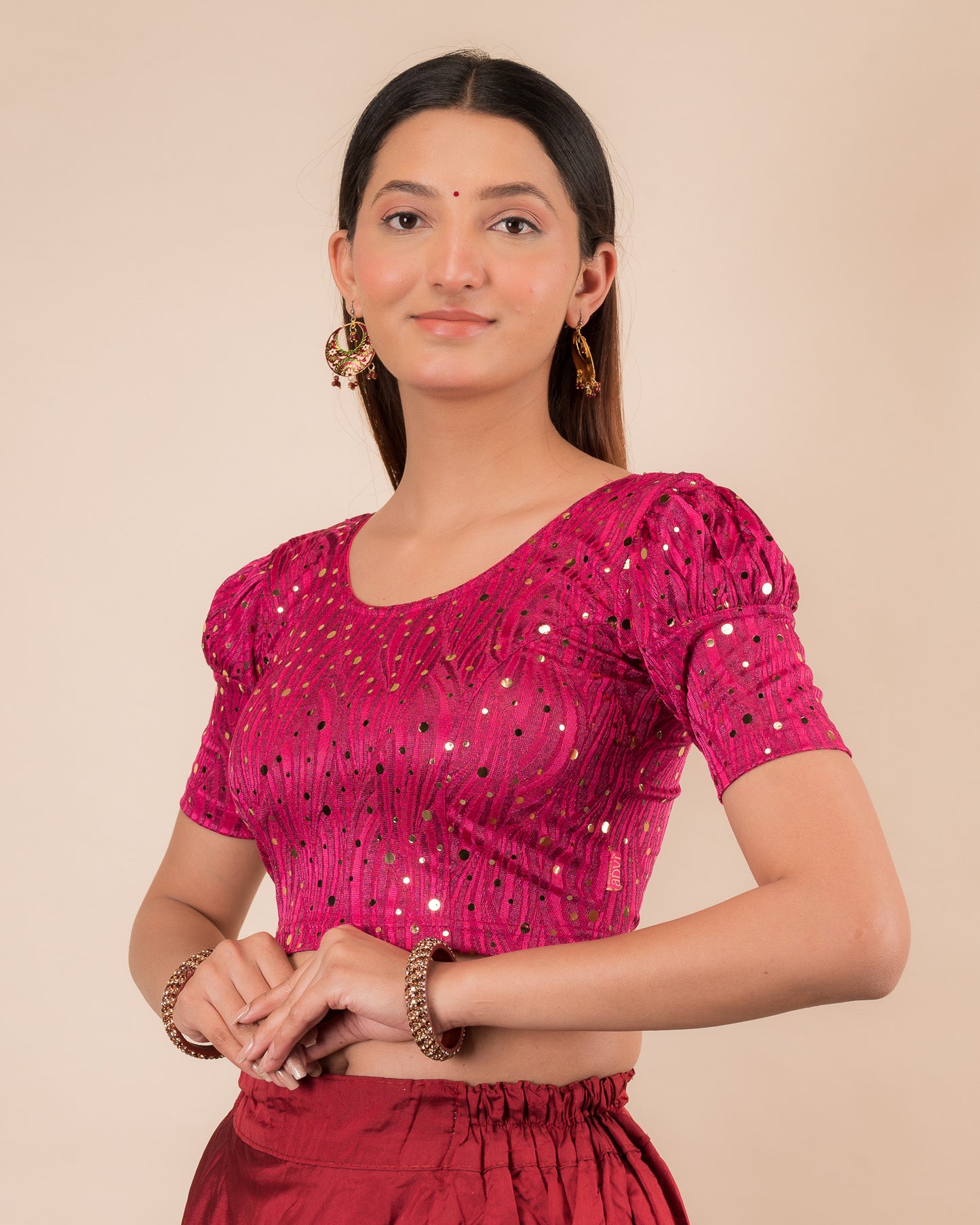Side profile highlighting the fit and puffed sleeve silhouette