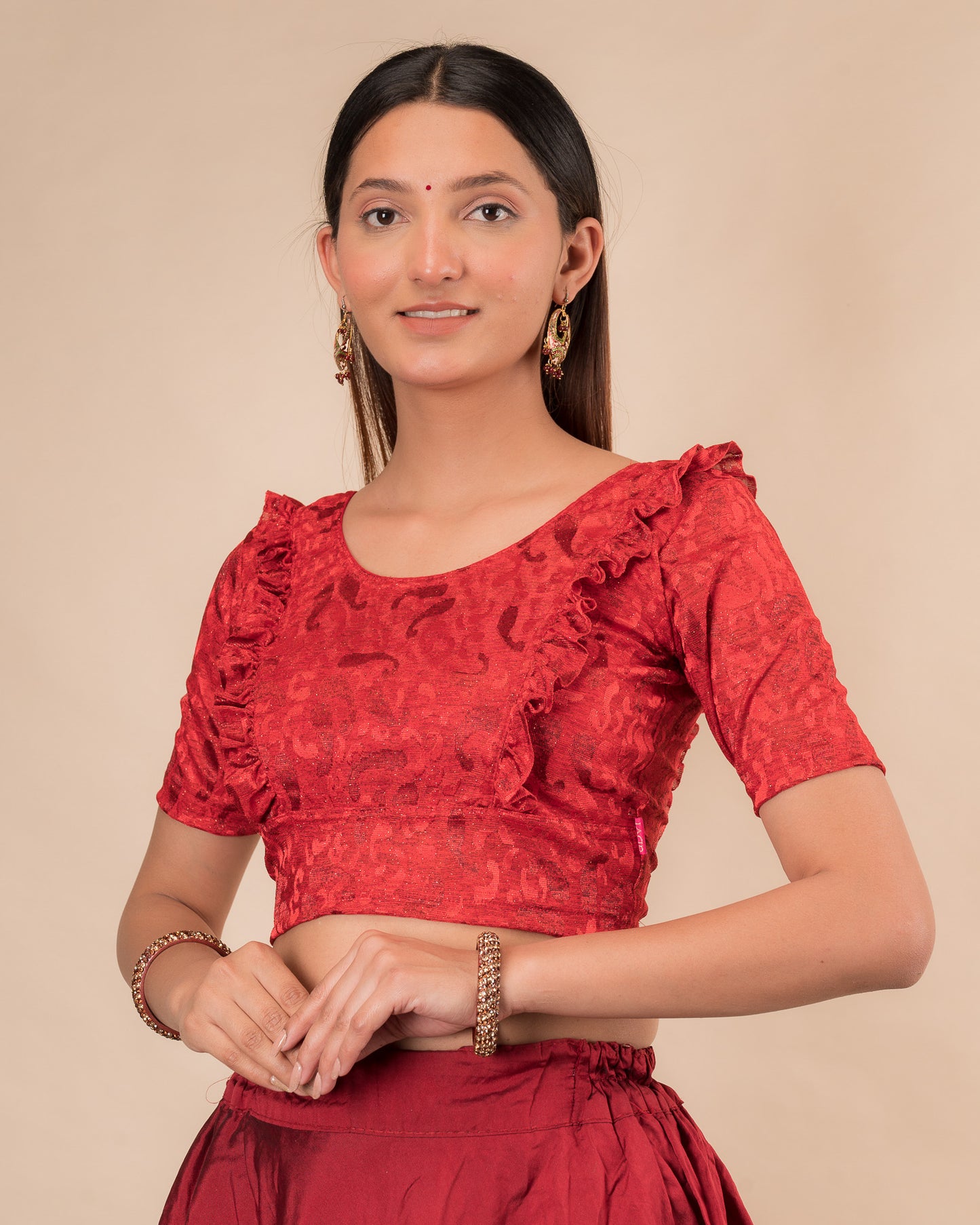 Side view highlighting the fit and shoulder ruffles