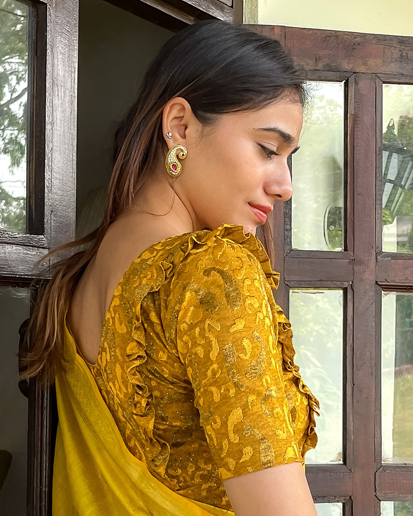 Model pairing the blouse with a saree or skirt for a festive look