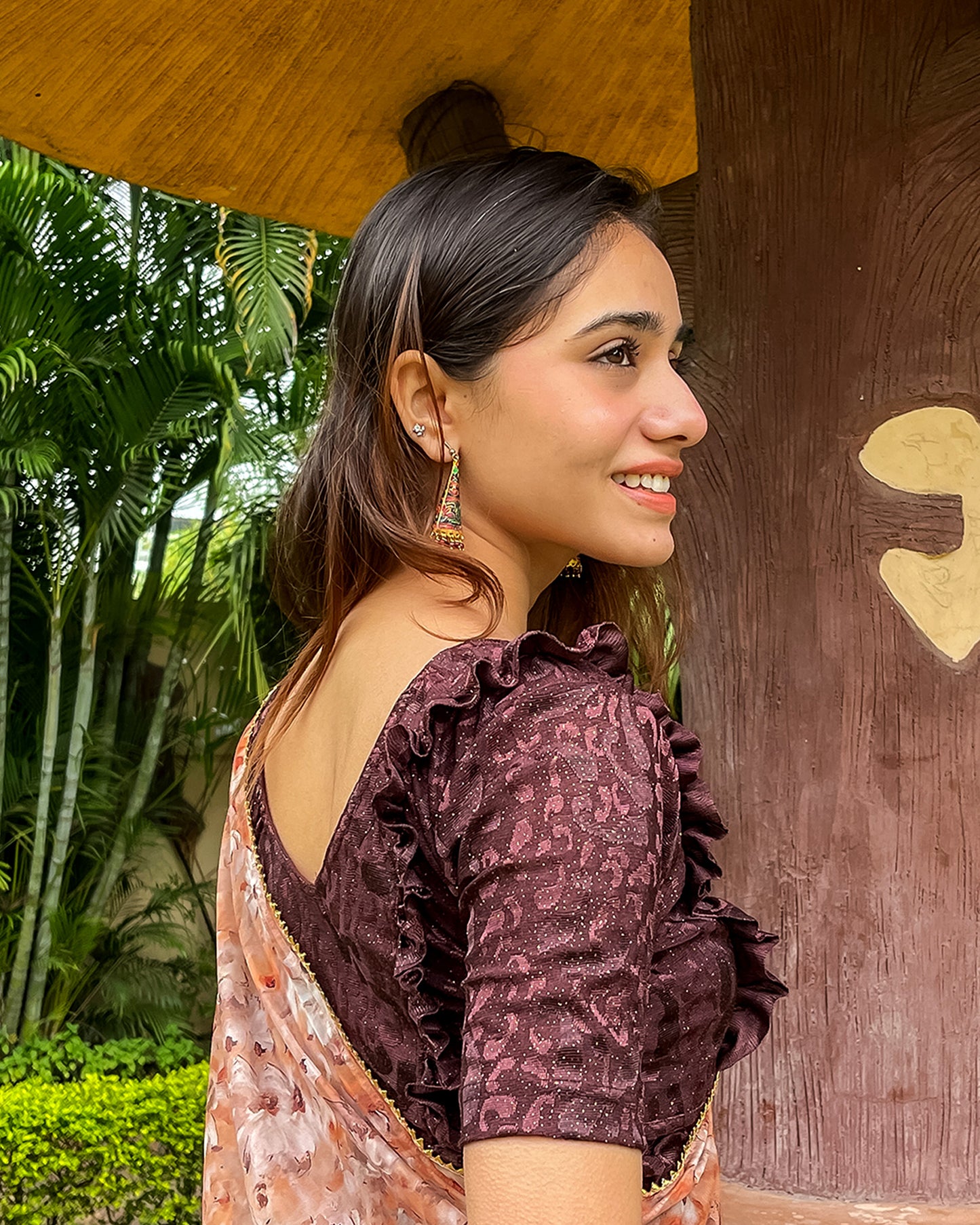 Model pairing the blouse with a saree or skirt for a festive look