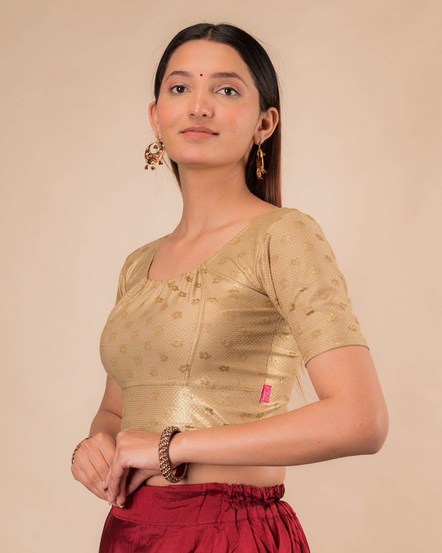Side profile highlighting the gathered fit and sleeve length
