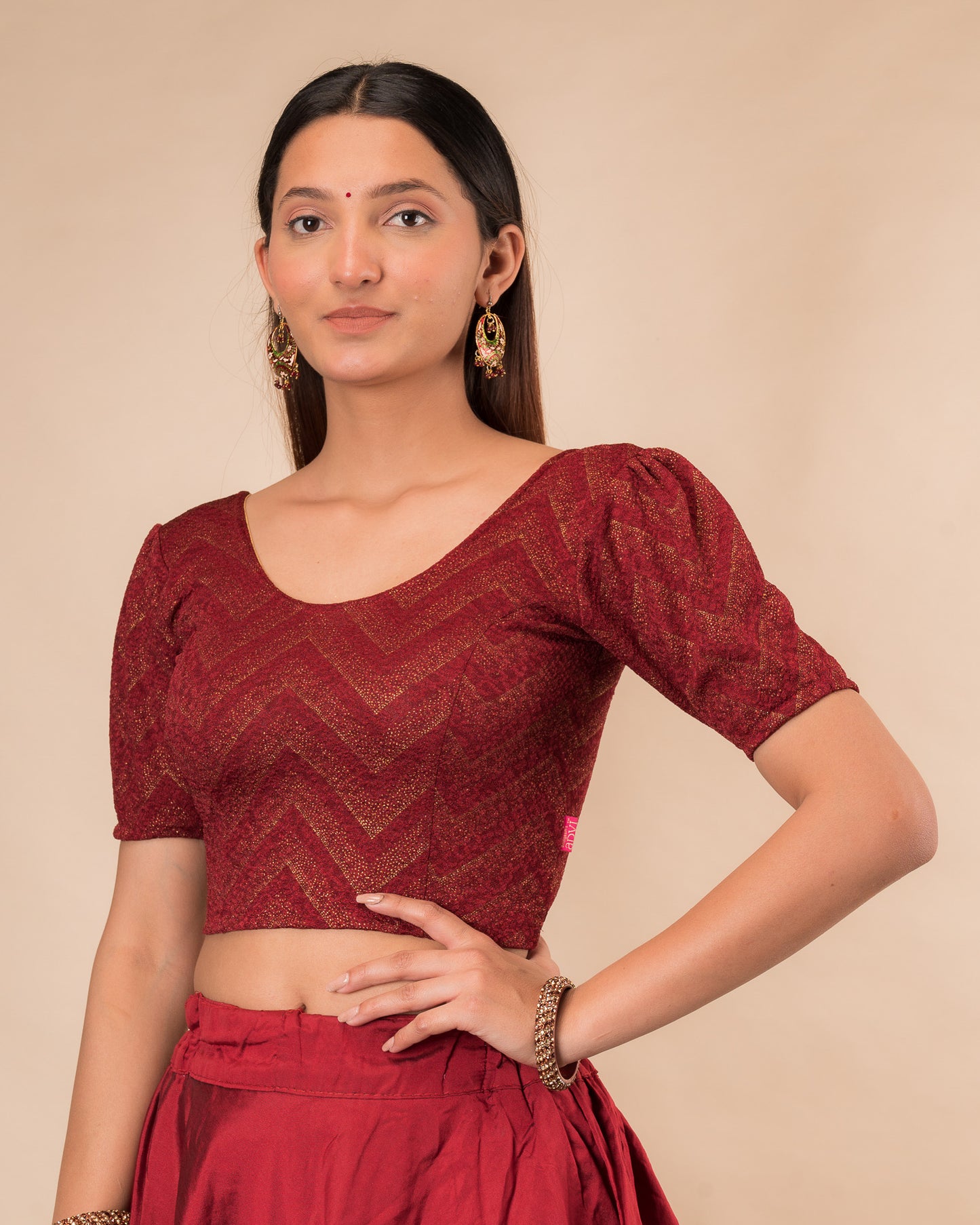 Side view highlighting the fit and shoulder ruffles