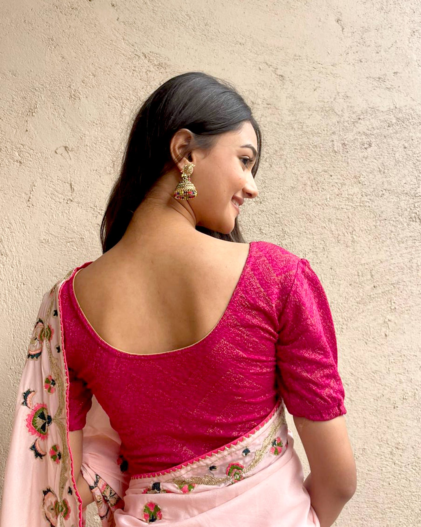 Model pairing the blouse with a saree or skirt for a festive look