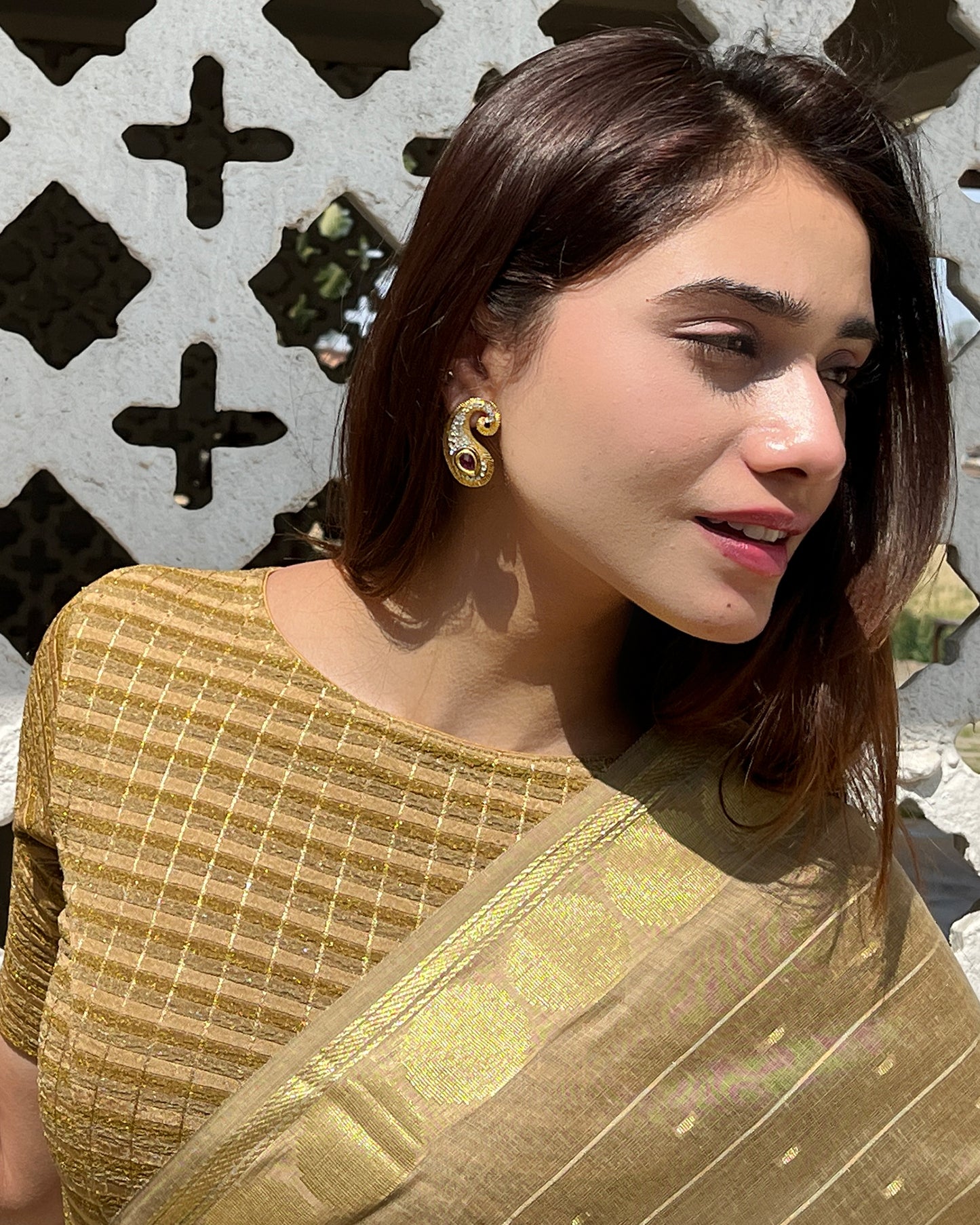 Model pairing the blouse with a saree for a complete ethnic look