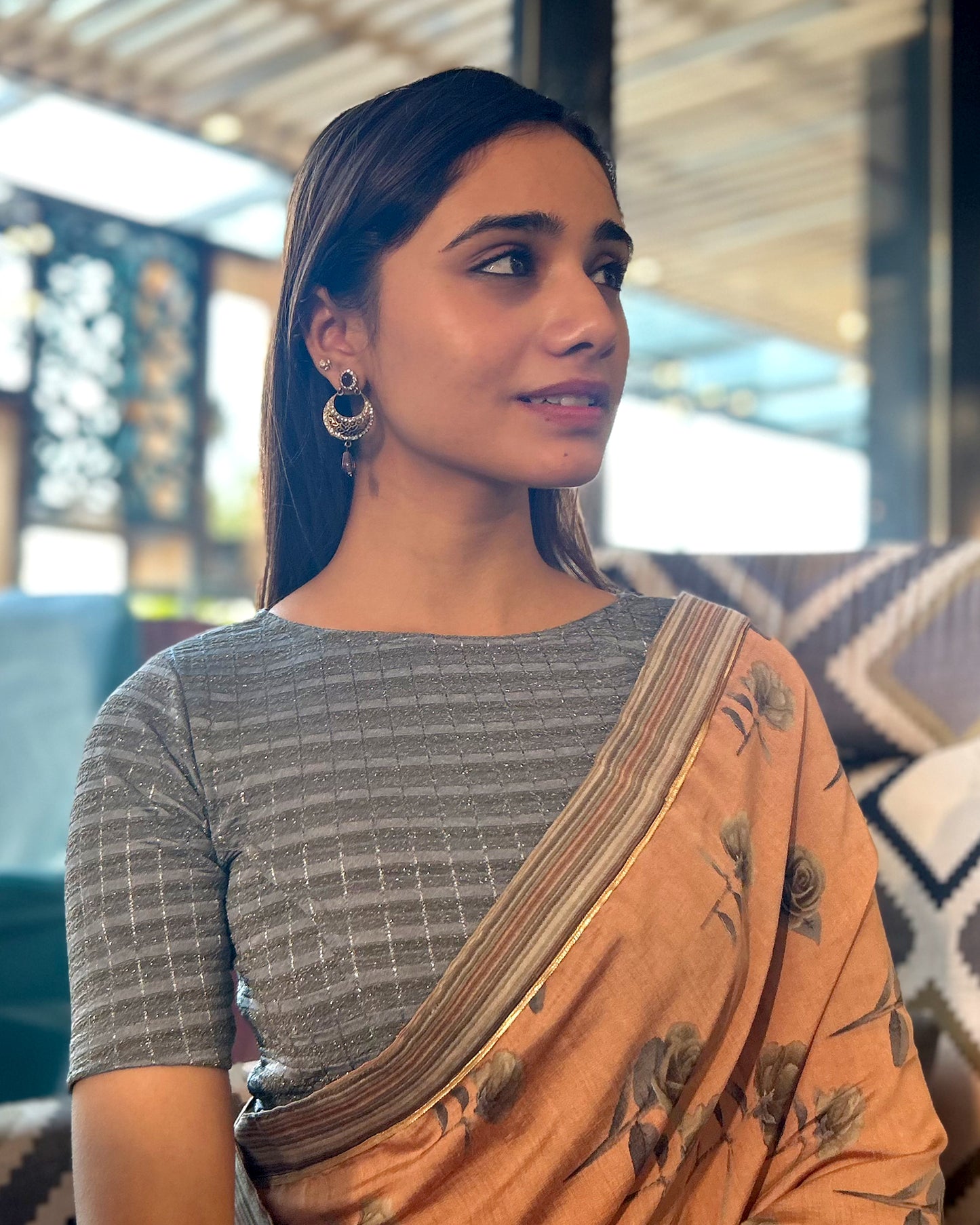 Model pairing the blouse with a saree for a complete ethnic look