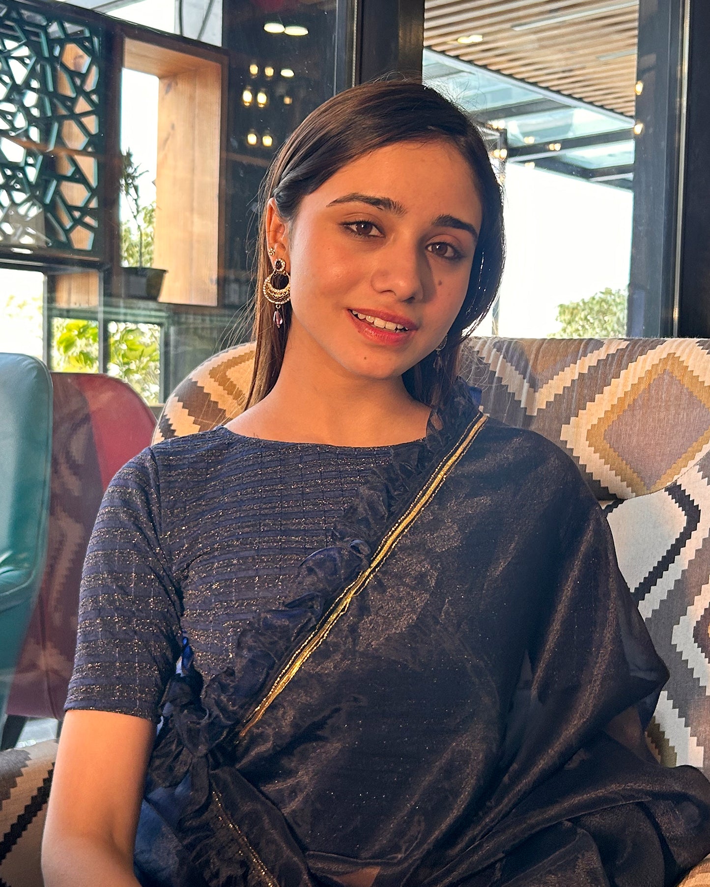 Model pairing the blouse with a saree for a complete ethnic look