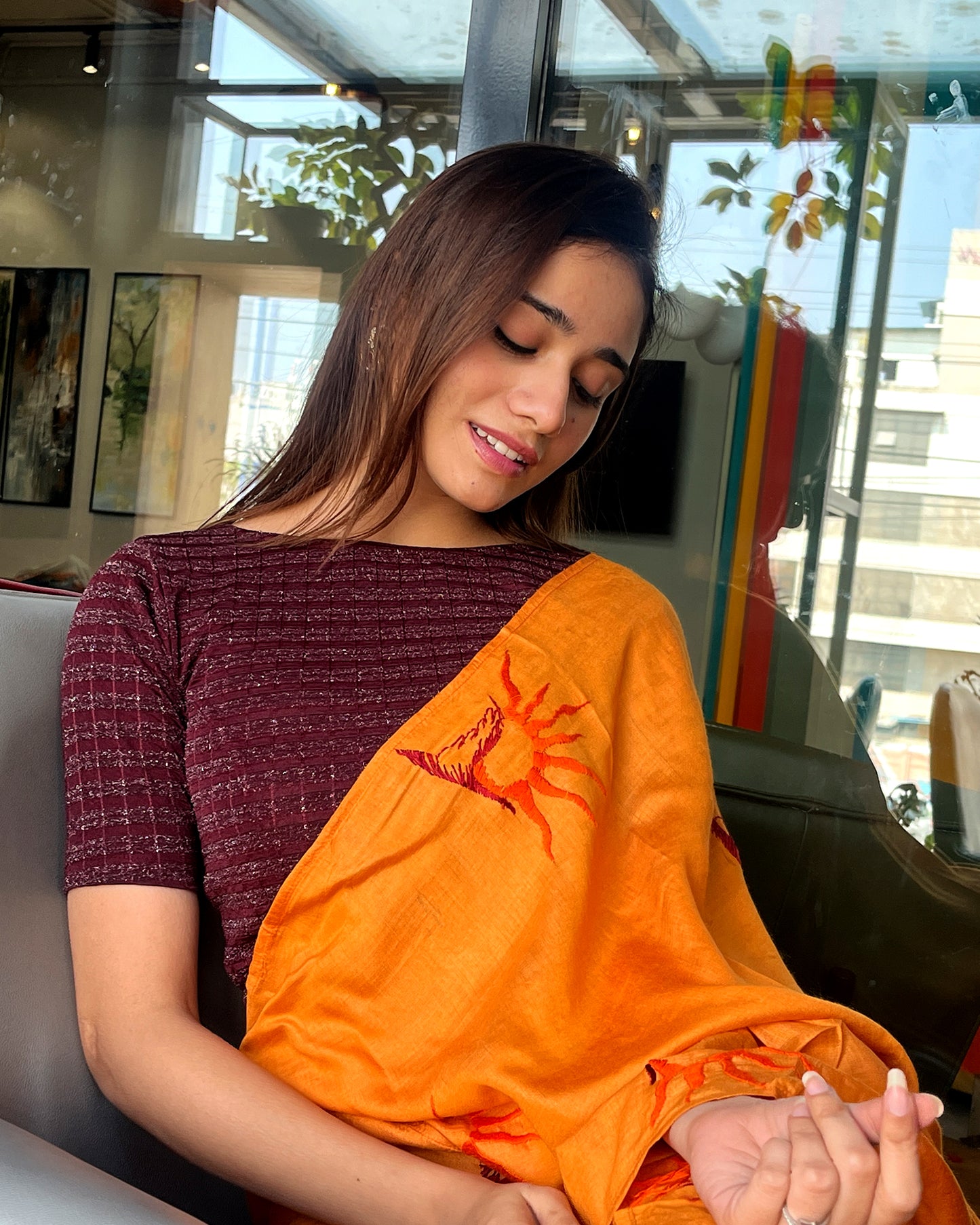 Model pairing the blouse with a saree for a complete ethnic look