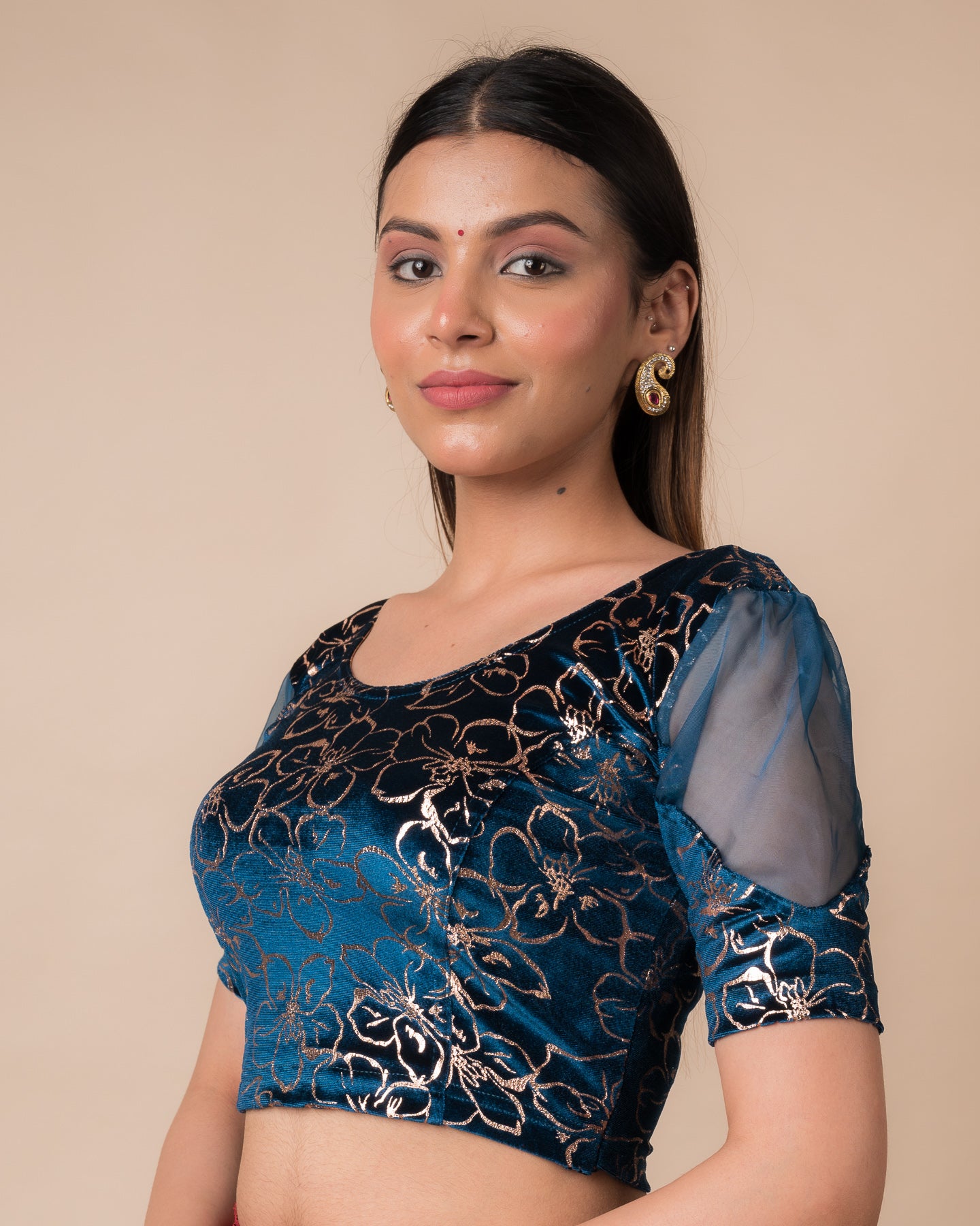 Side profile highlighting the puff sleeves and fit