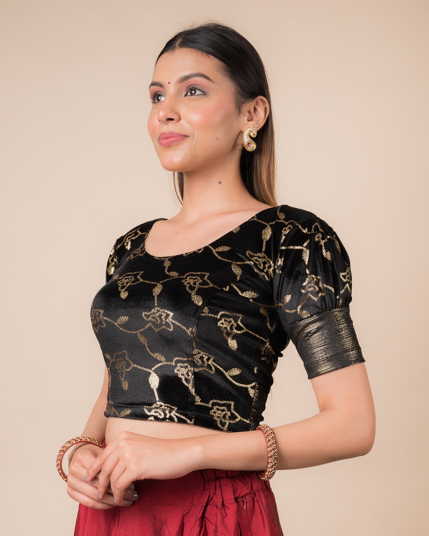 Side profile highlighting the puffed sleeves and fit