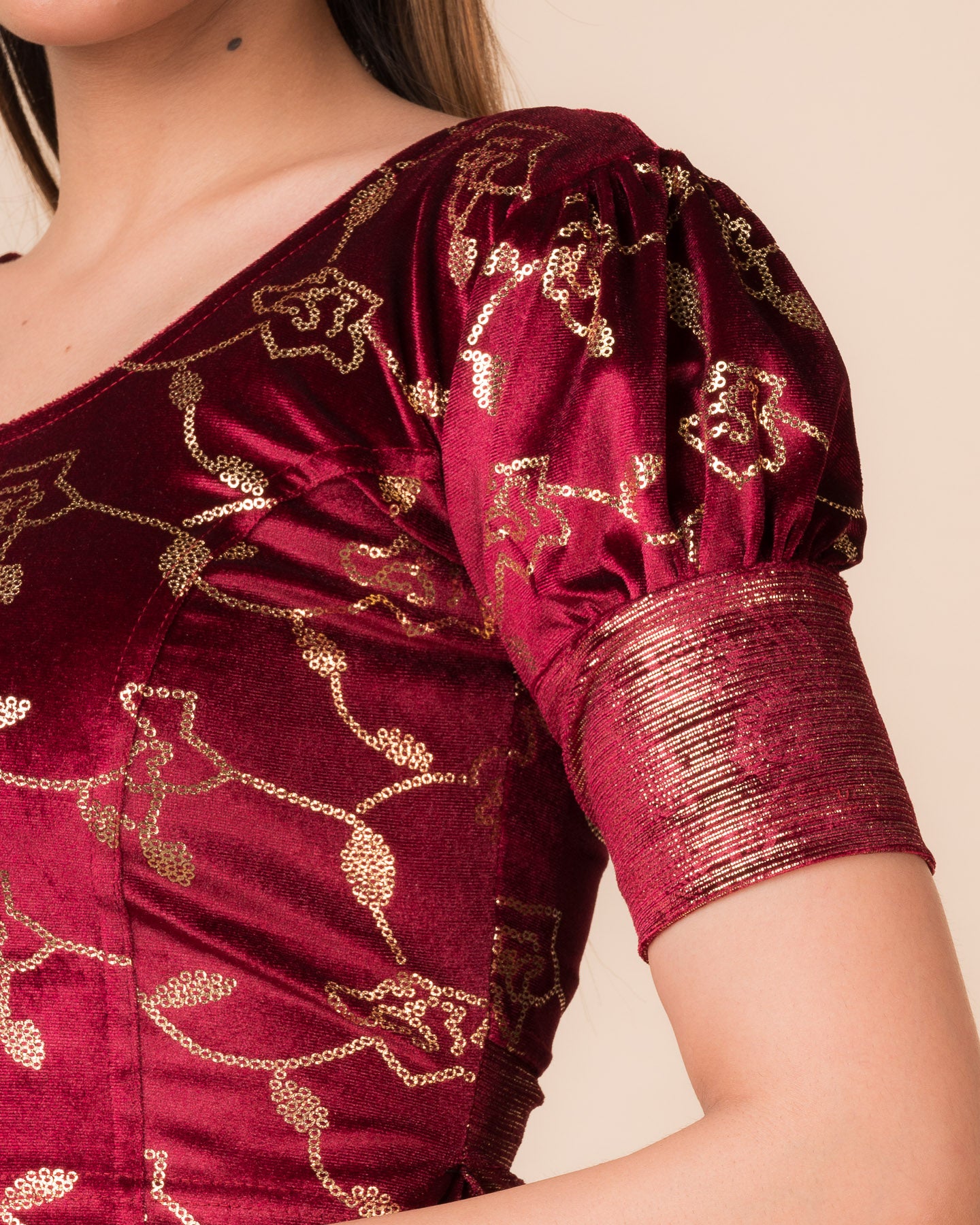 Close-up of the velvet with sequin foil detailing