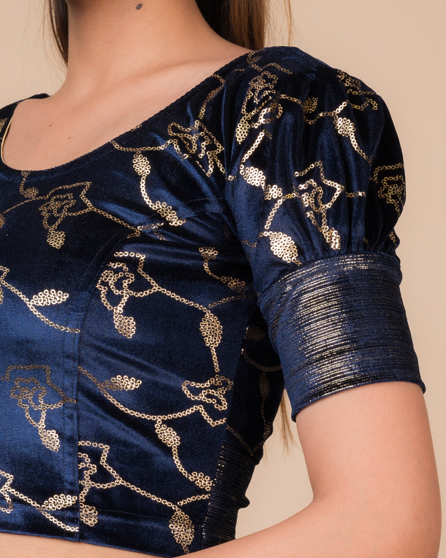 Close-up of the velvet with sequin foil detailing