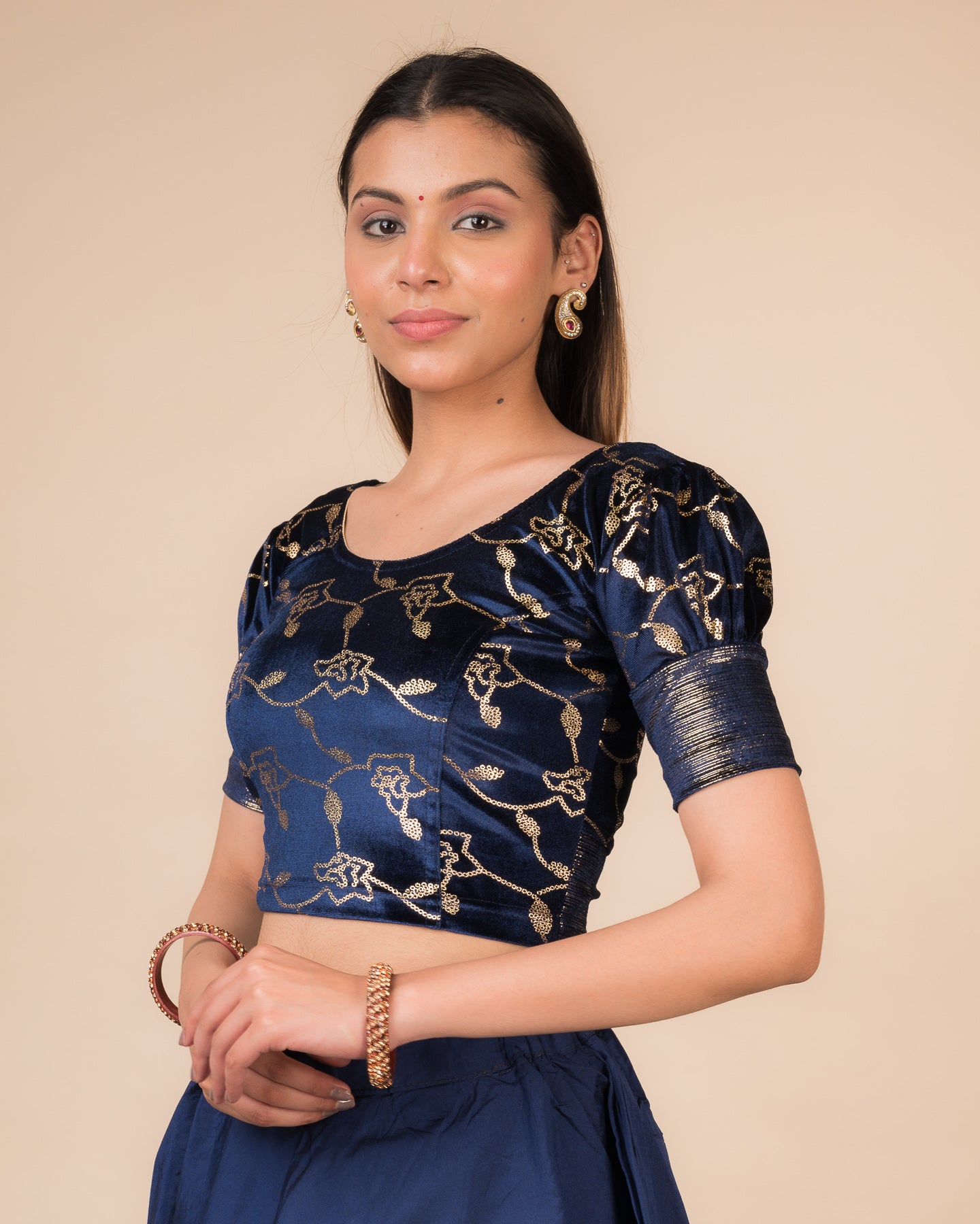 Side profile highlighting the puffed sleeves and fit