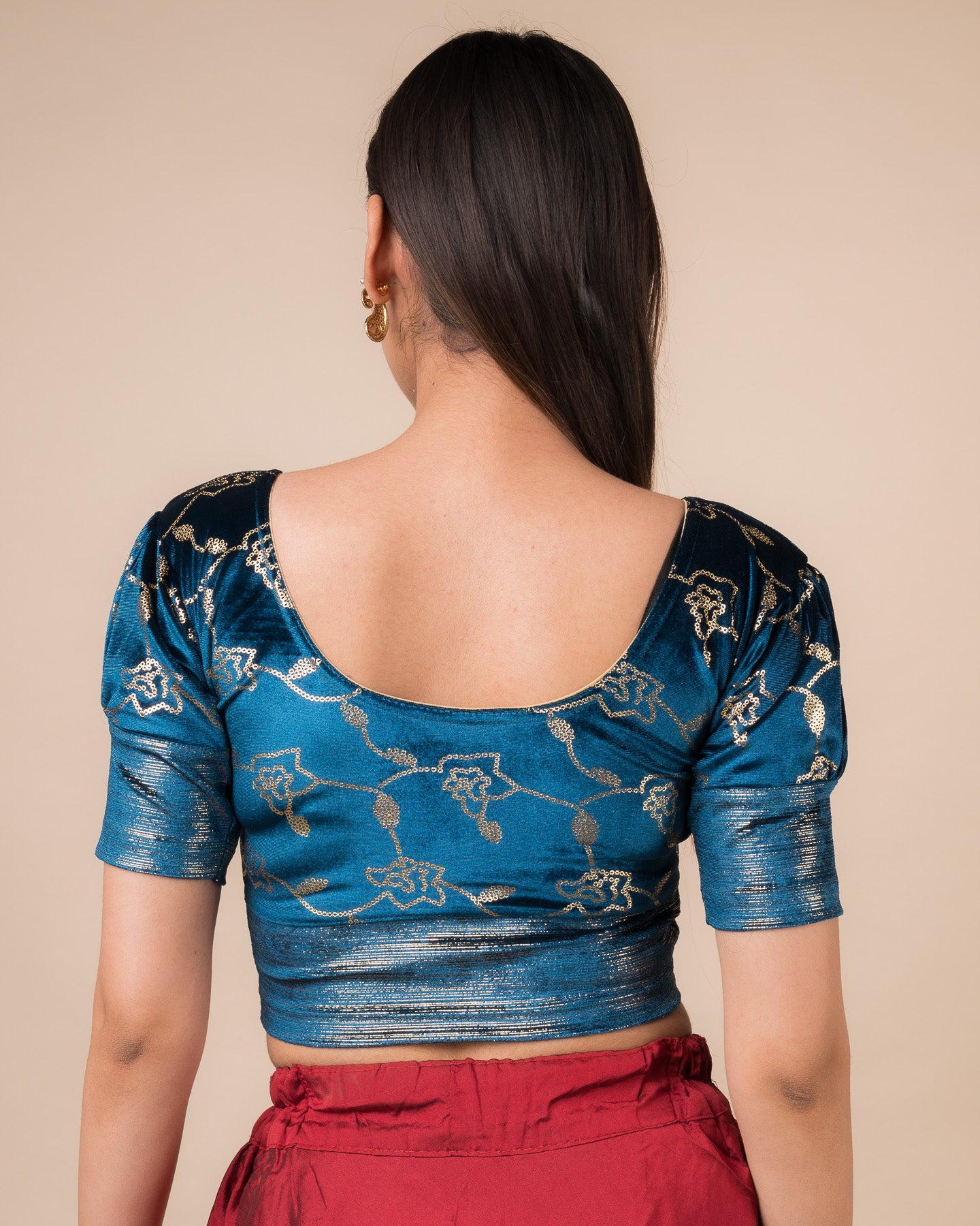 Rear view showcasing the puff sleeves and back silhouette