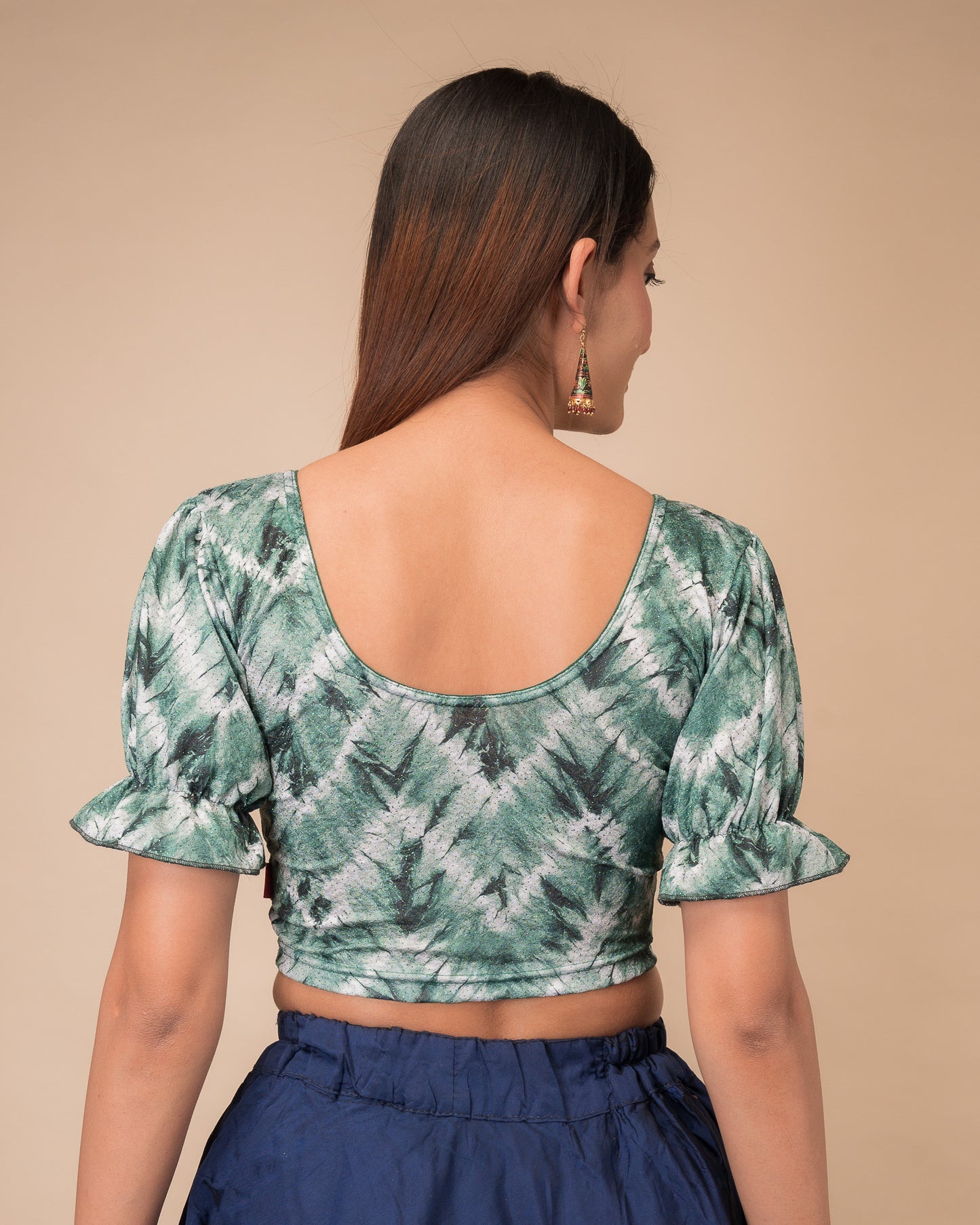Rear view showcasing the slip-on back design and tie-dye pattern