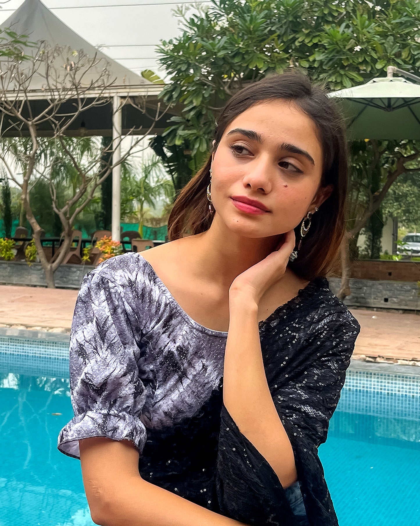 Model pairing the blouse with a festive saree to complete the ethnic look