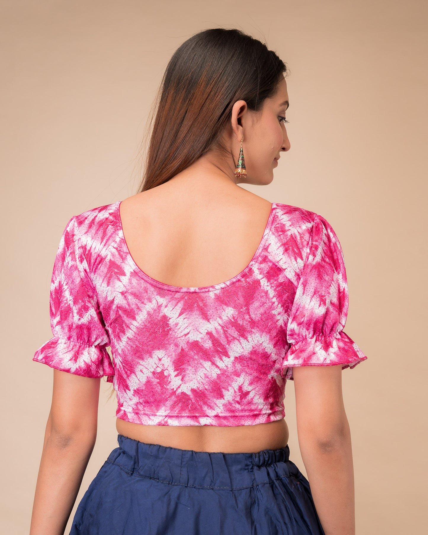 Rear view showcasing the slip-on back design and tie-dye pattern