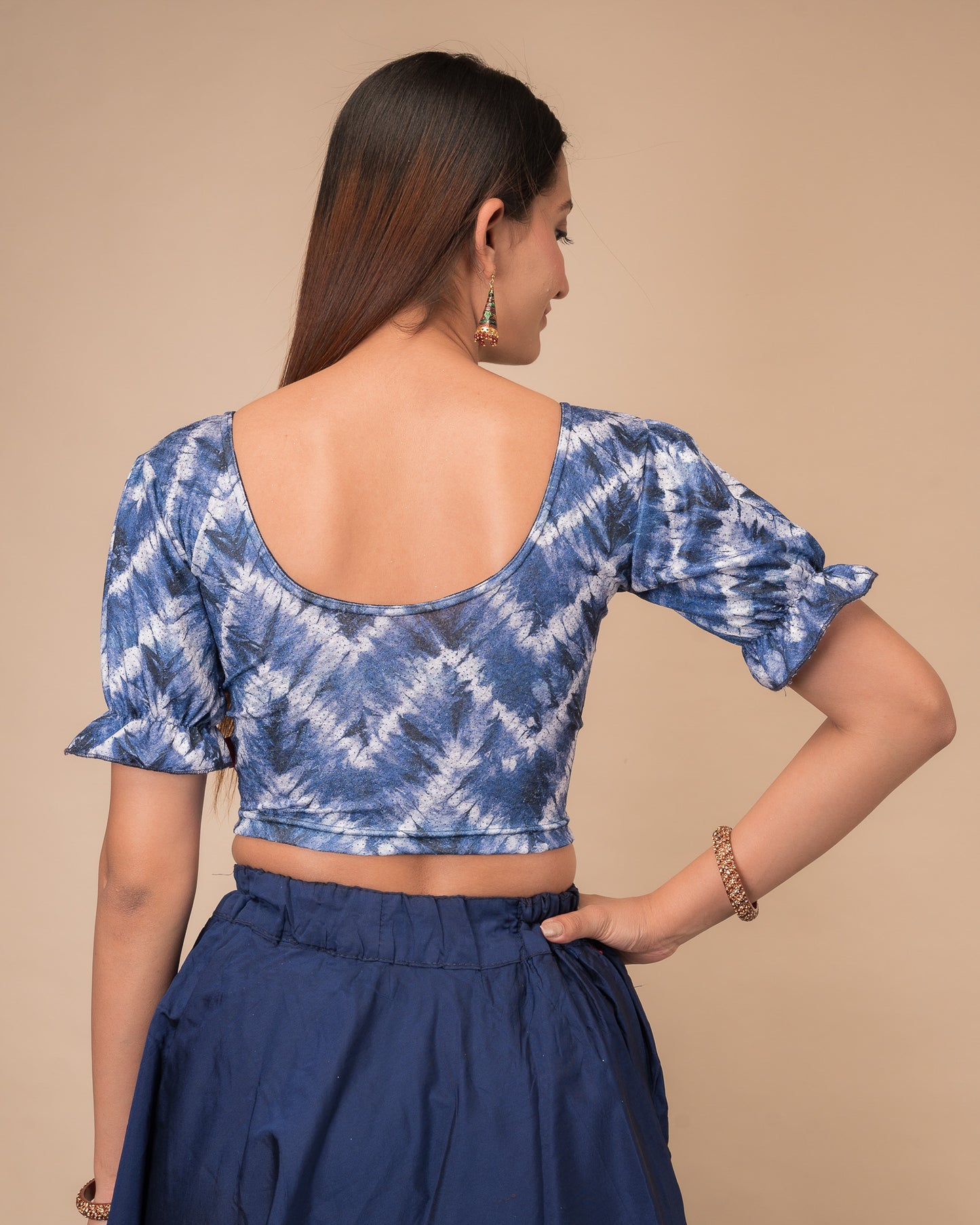 Rear view showcasing the slip-on back design and tie-dye pattern