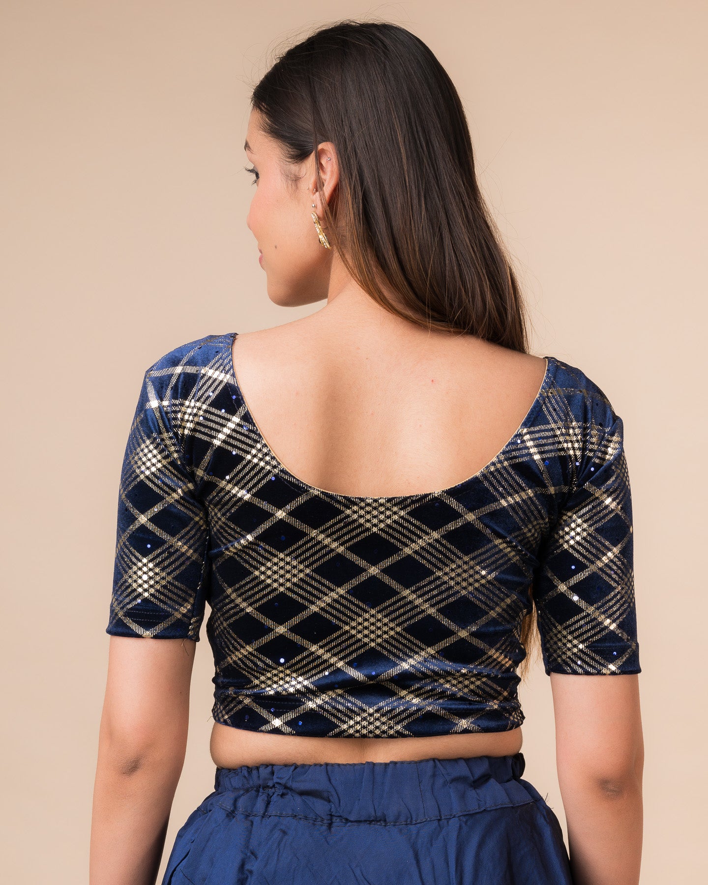 Rear view showcasing the check motif and back design