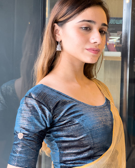 Model pairing the blouse with a festive saree for an ethnic look