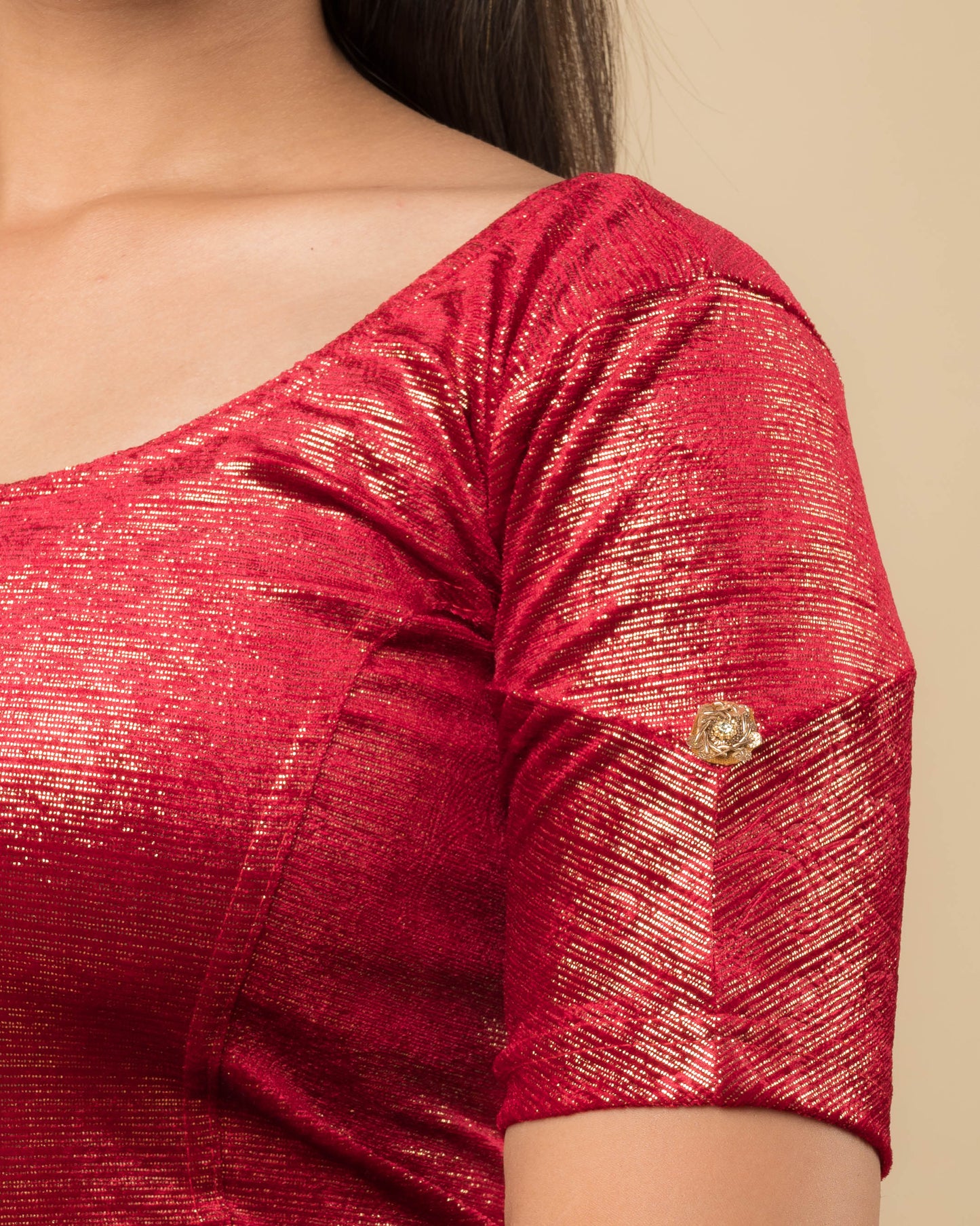 Close-up of the jacquard knit with double metallic print.
