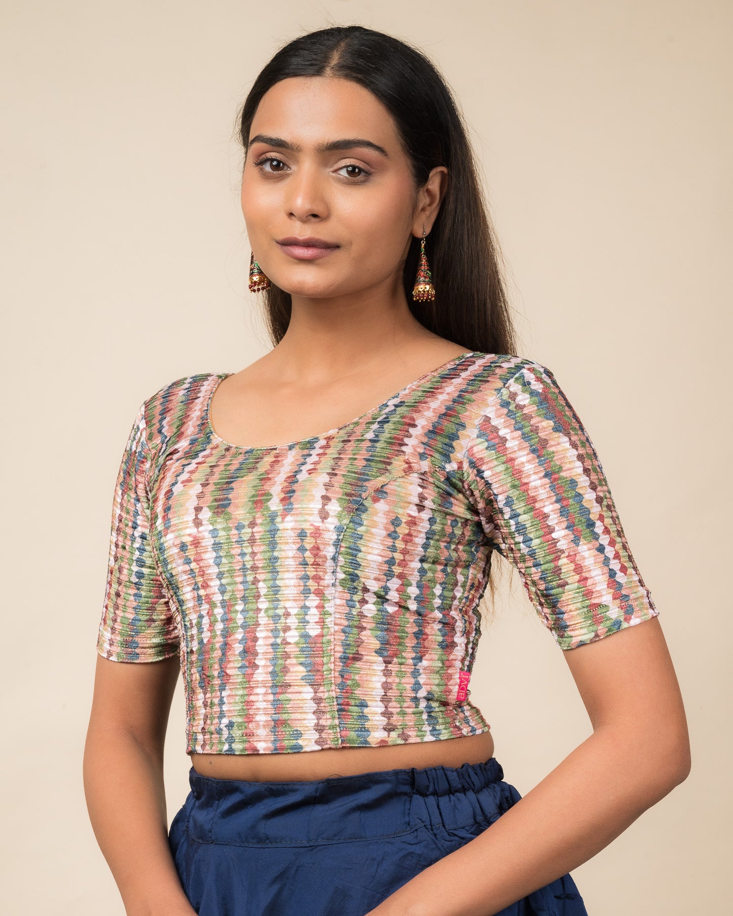 Side profile of the velvet stretchable blouse highlighting the fit and sleeve length.