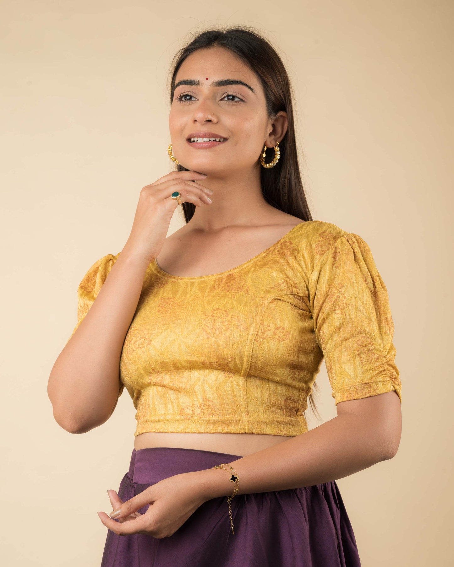 Side profile of the corset-style stretchable blouse highlighting the fit and sleeve length.
