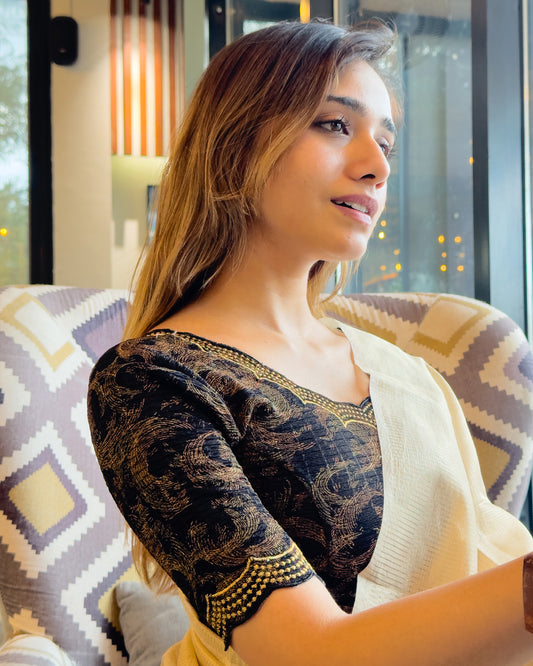 Model pairing the Black-colored stretchable blouse with a traditional saree, demonstrating a complete ethnic look.