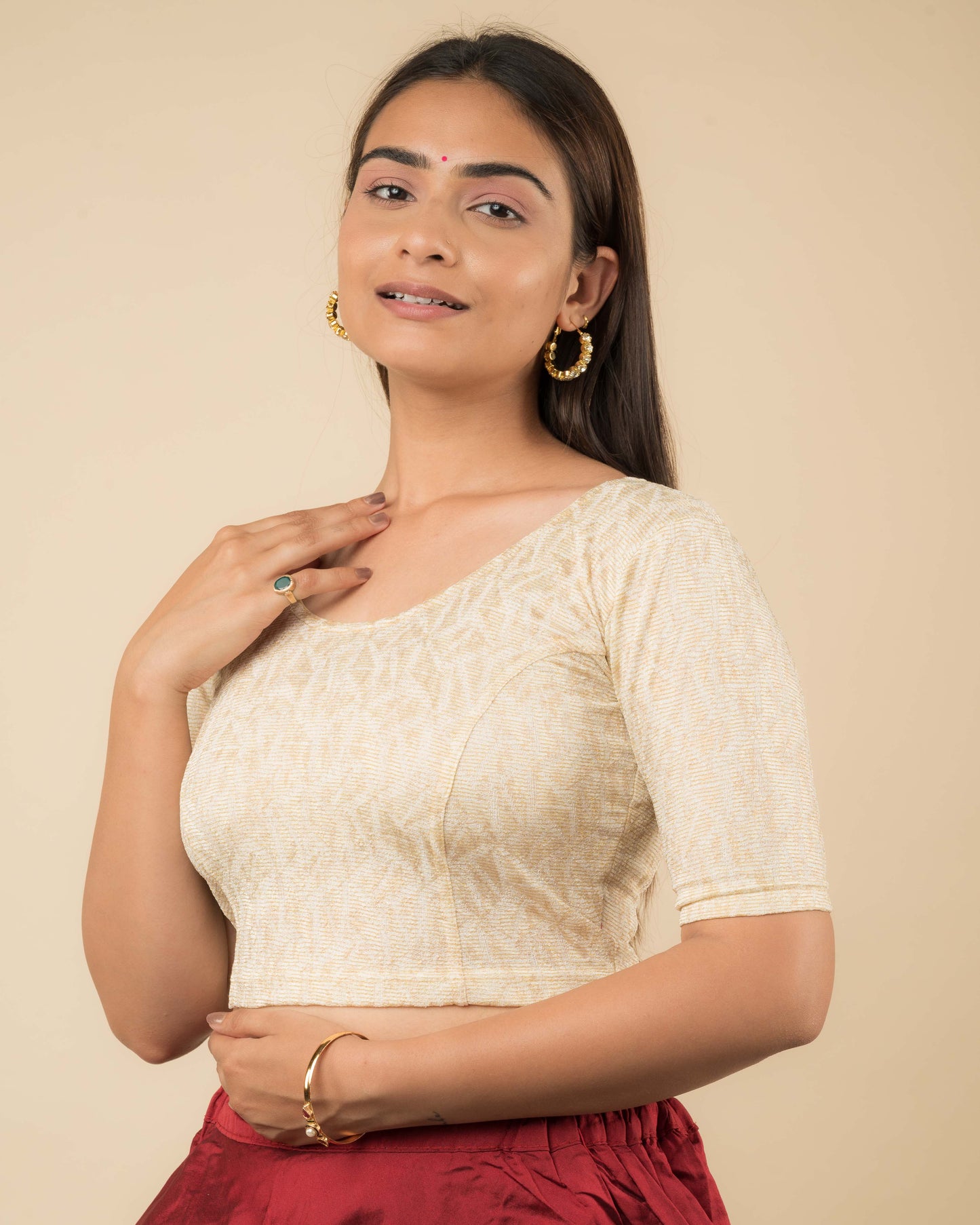 Side profile of the jacquard stretchable blouse highlighting the fit and sleeve length.