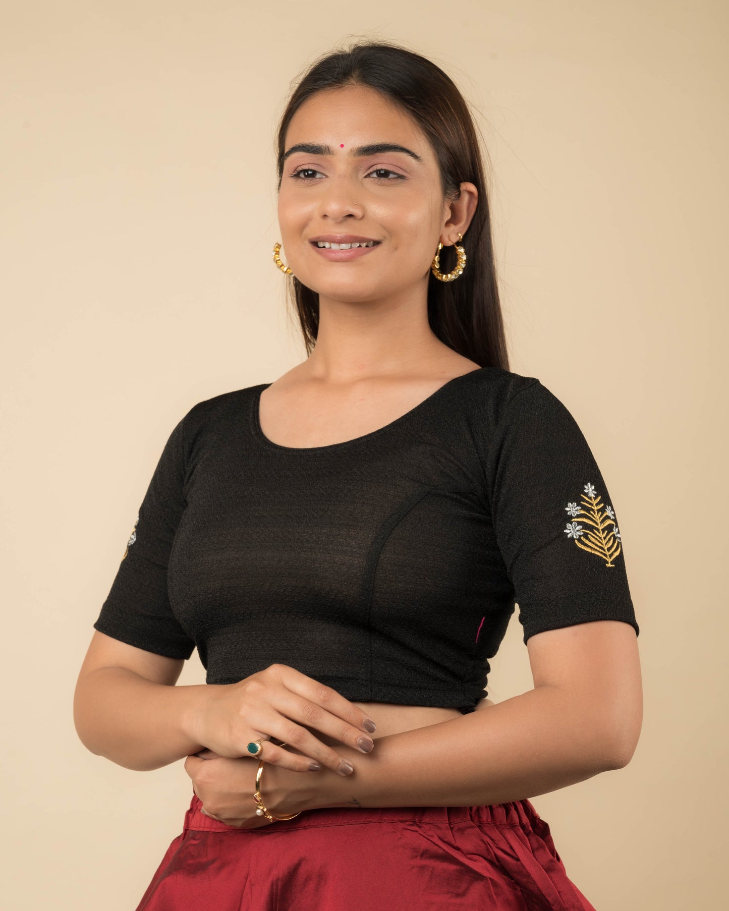 Side profile of the buti embroidered stretchable blouse highlighting the fit and sleeve length.
