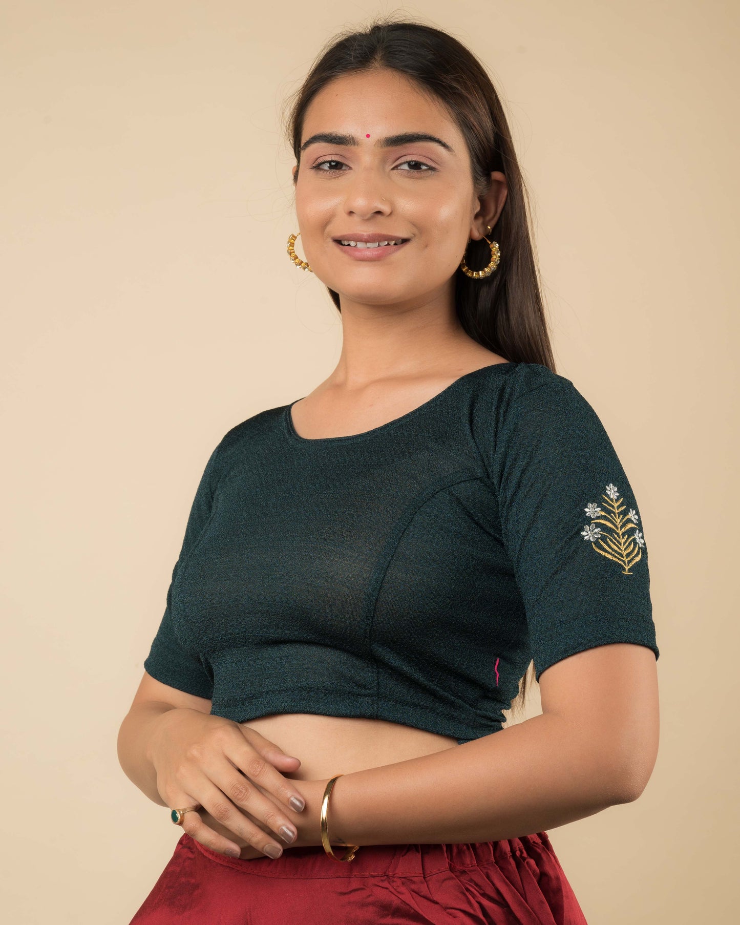 Side profile of the buti embroidered stretchable blouse highlighting the fit and sleeve length.