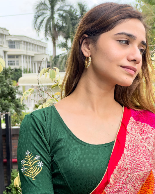 Model pairing the buti embroidered stretchable blouse with a traditional saree, demonstrating a complete ethnic look.