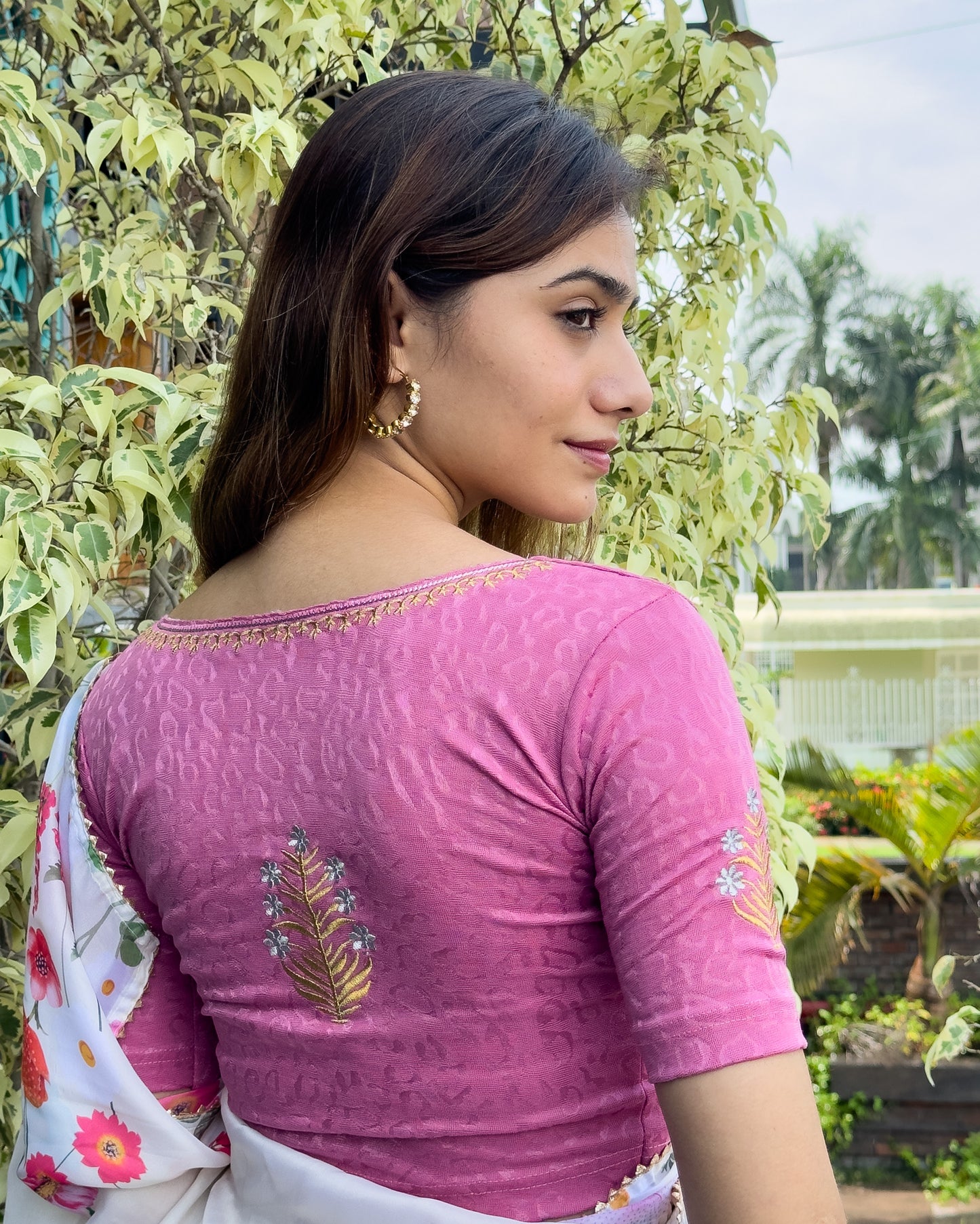 Model pairing the buti embroidered stretchable blouse with a traditional saree, demonstrating a complete ethnic look.
