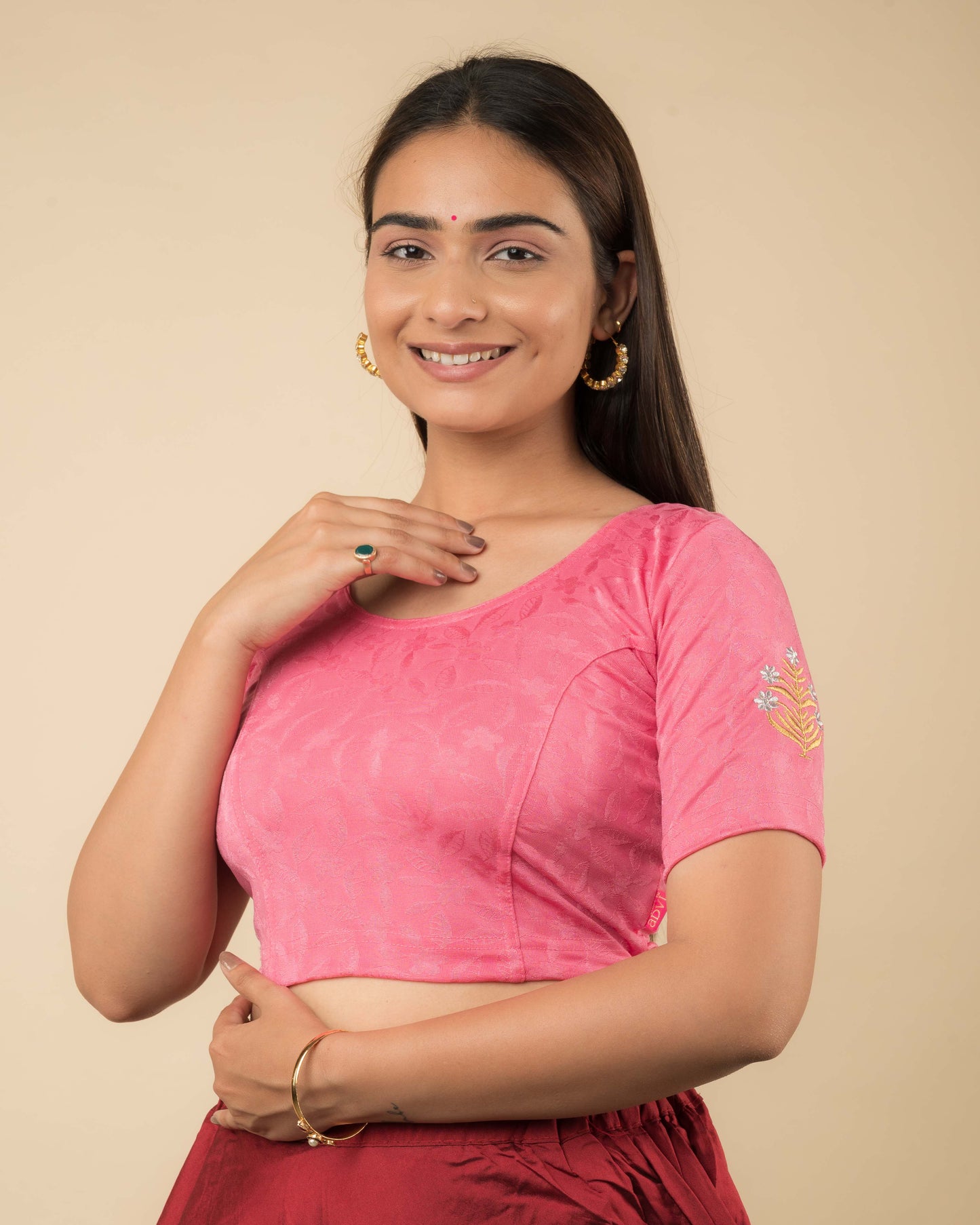 Side profile of the buti embroidered stretchable blouse highlighting the fit and sleeve length.