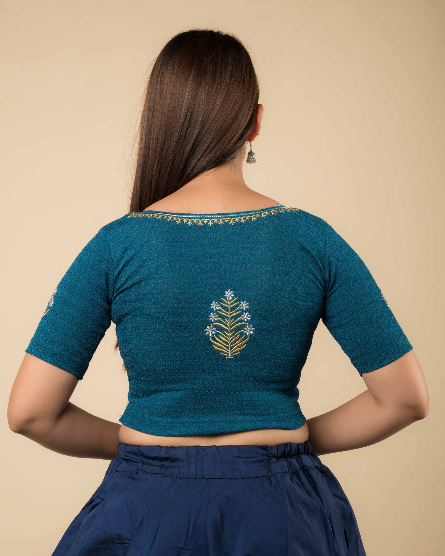 Rear view of the buti embroidered stretchable blouse showcasing the back design.
