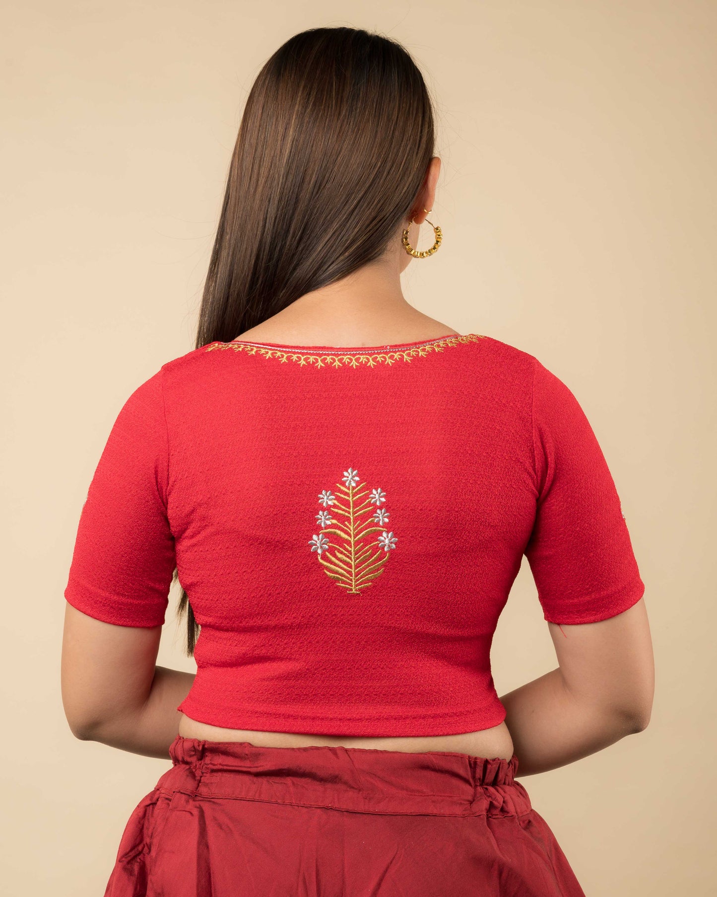 Rear view of the buti embroidered stretchable blouse showcasing the back design.