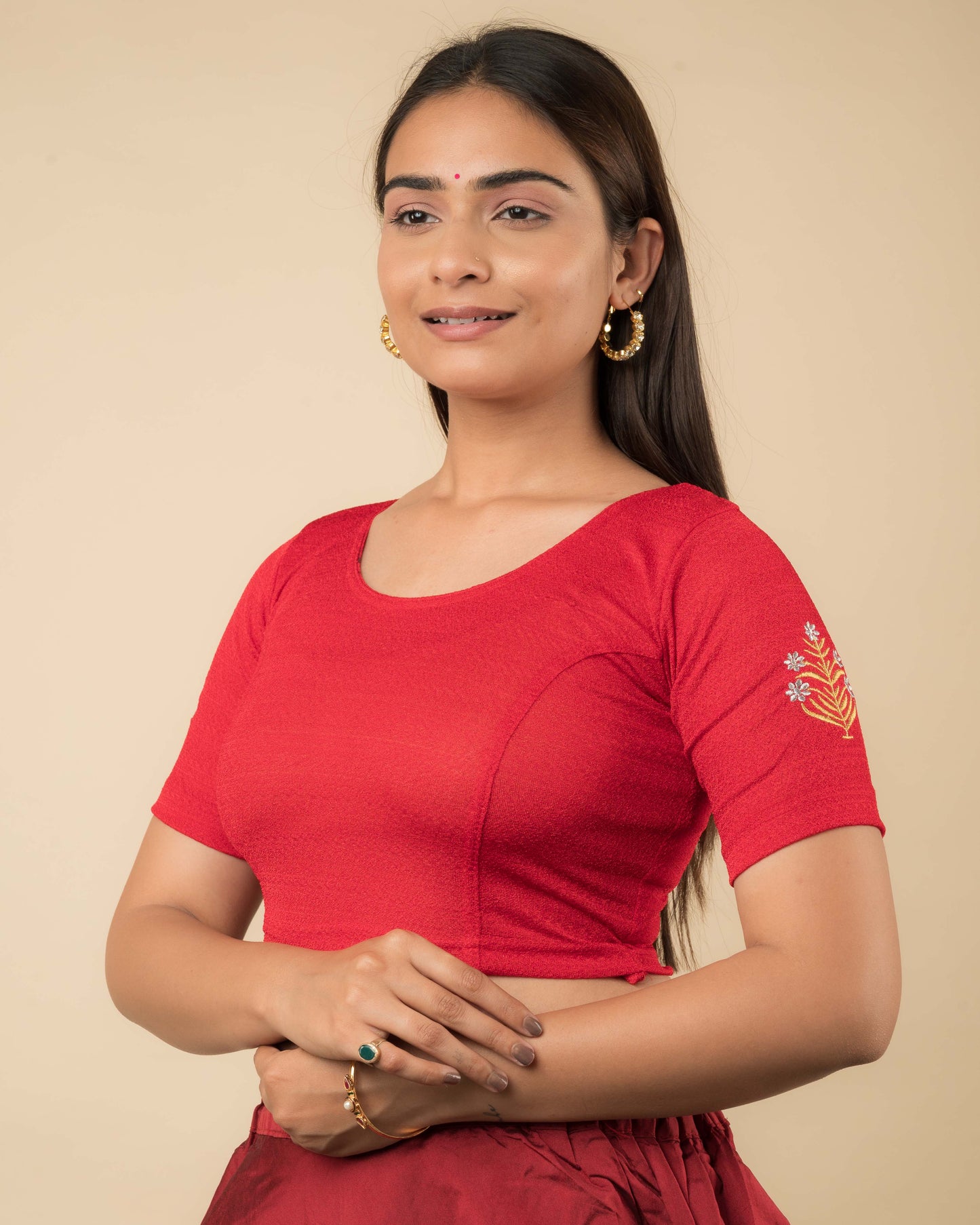 Side profile of the buti embroidered stretchable blouse highlighting the fit and sleeve length.