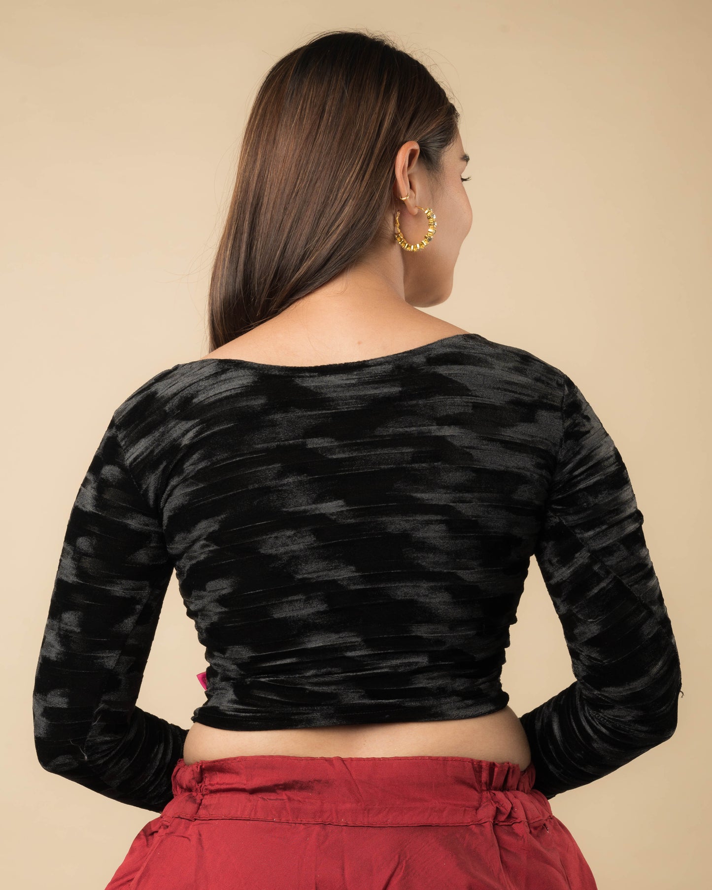 Rear view of the black velvet stretchable blouse showcasing the back design