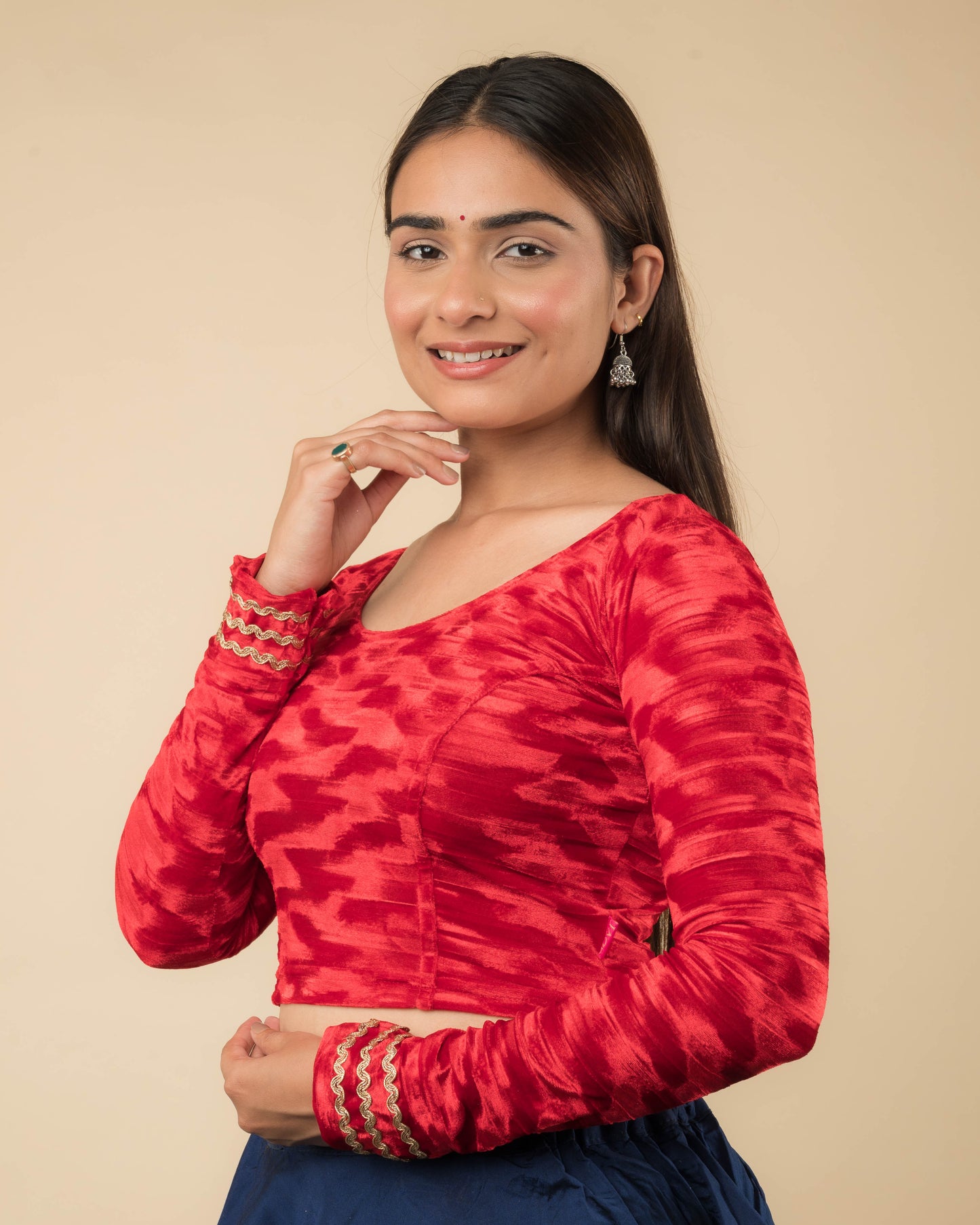 Side profile of the velvet stretchable blouse highlighting the fit and sleeve length.