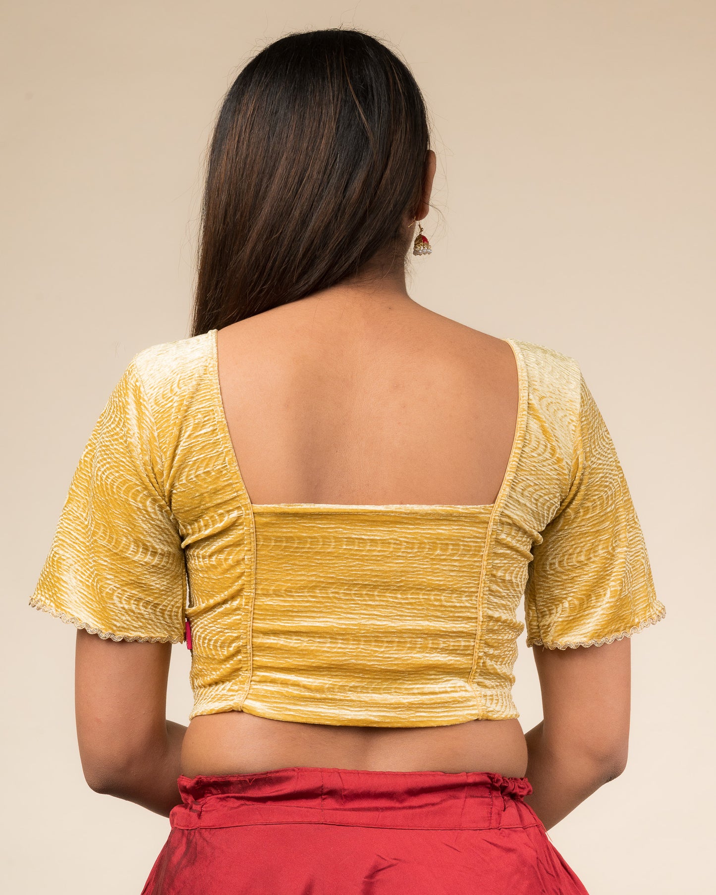 Rear view of the velvet stretchable blouse showcasing the back design.